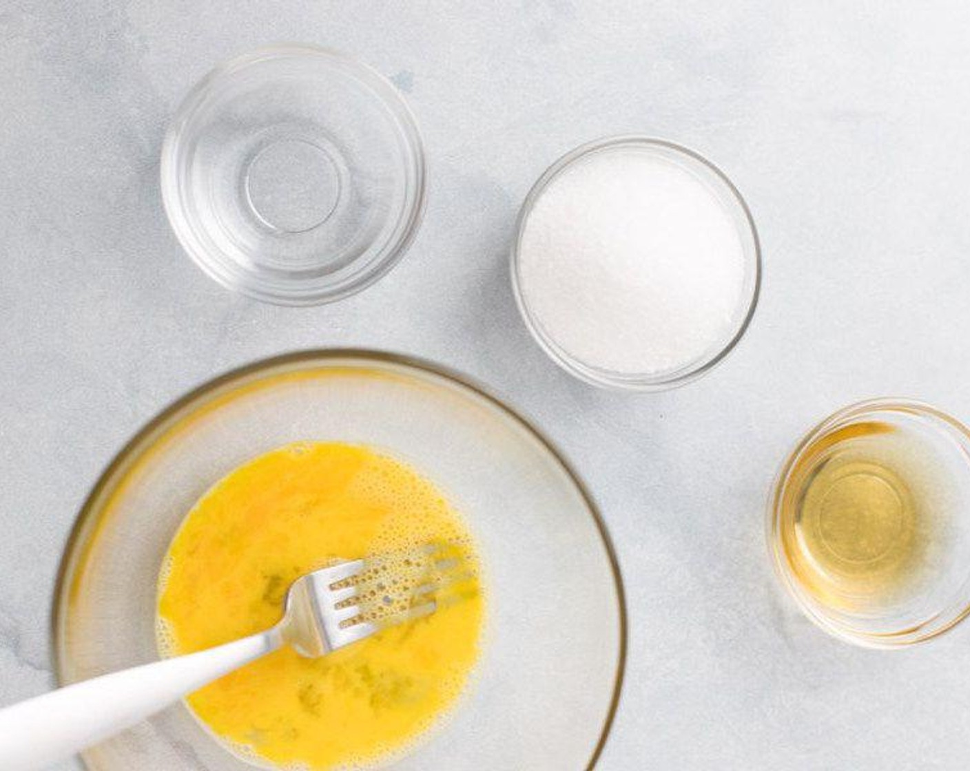 step 1 Whisk together the Farmhouse Eggs® Large Brown Egg (1), Apple Cider Vinegar (2 Tbsp), Water (2 Tbsp), and Granulated Sugar (4 Tbsp) until well combined.