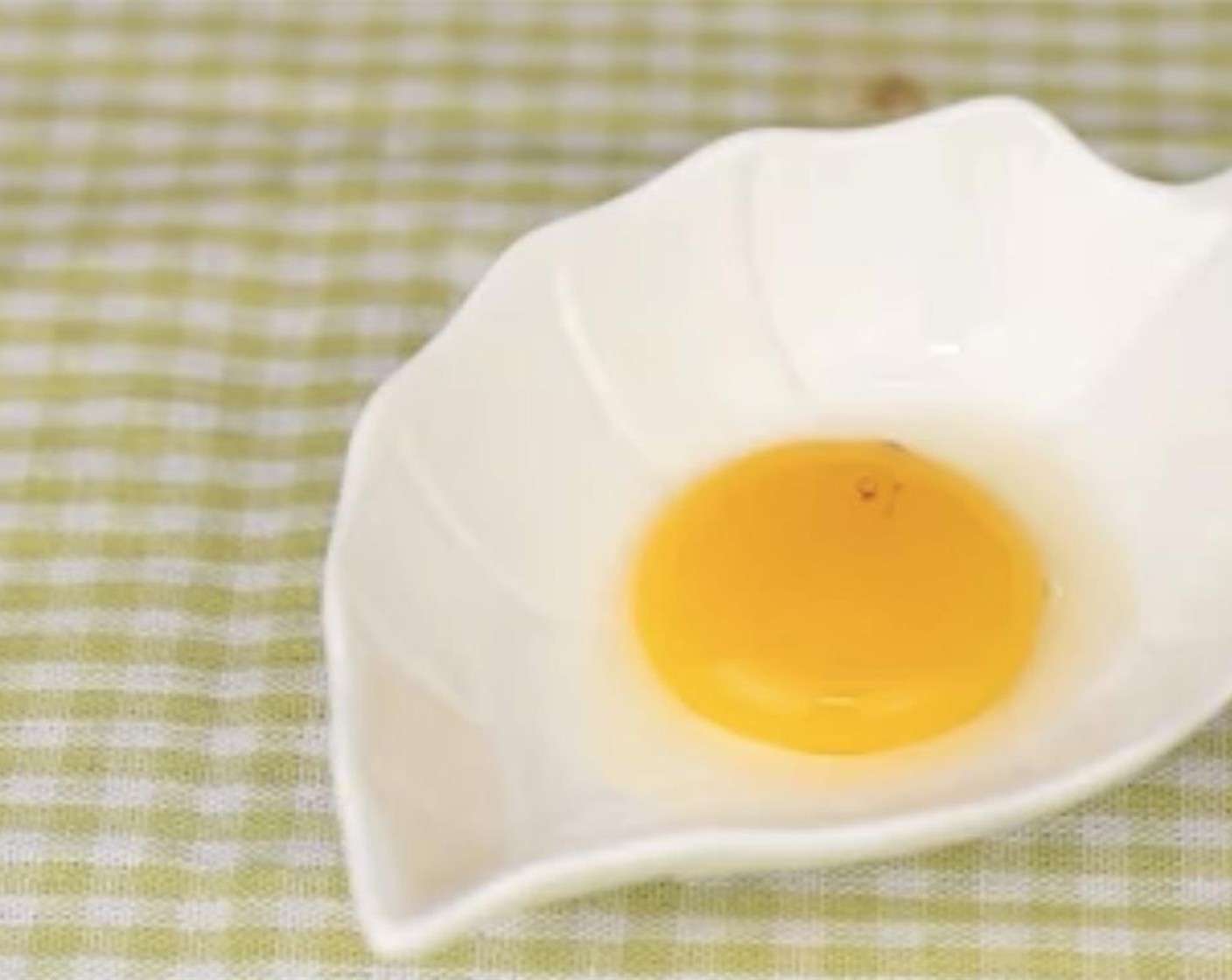 step 2 Drizzle in Eggland's Best Classic Egg (1) and Pandan Paste (1 Tbsp).