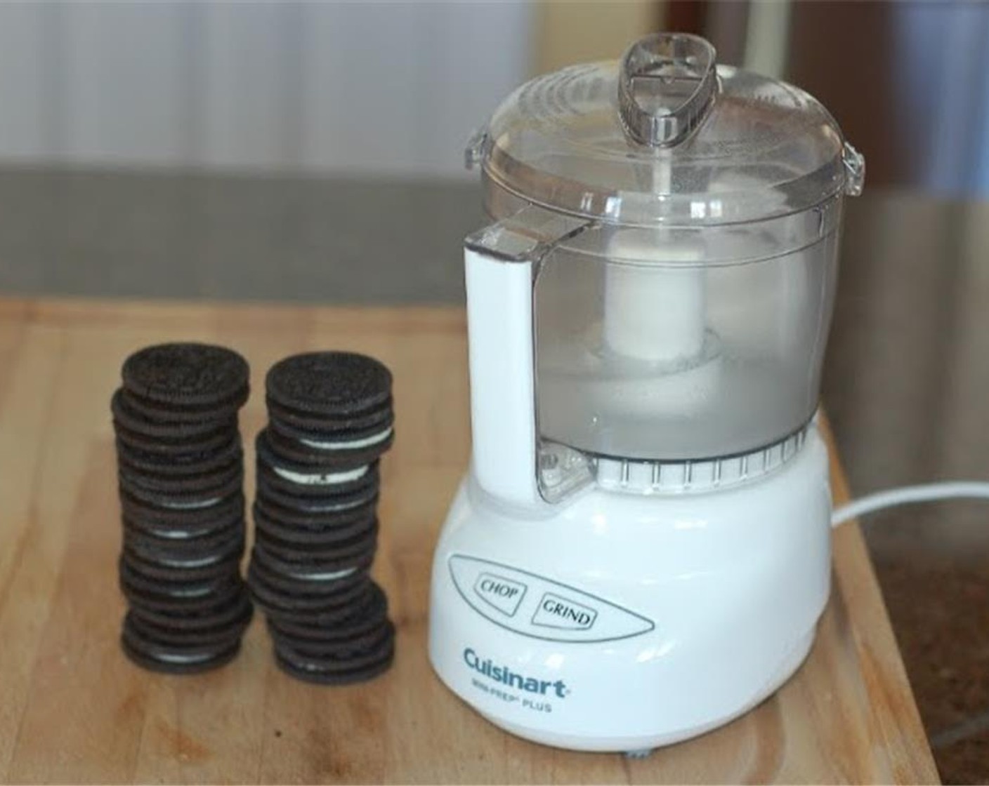 step 1 Pulse the Oreo® Chocolate Sandwich Cookies (1 pckg) in a food processor until they're all fine crumbs.