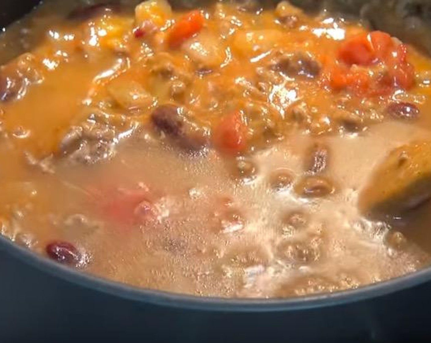 step 3 Add Canned Diced Tomatoes (1 3/4 cups), Red Kidney Beans (2 1/2 cups), McCormick® Taco Seasoning Mix (1/4 cup), Cream of Chicken Soup (10.5 oz) and Water (1/2 cup). Mix together. Let simmer for 5-10 minutes, or until the mixture has thickened slightly.
