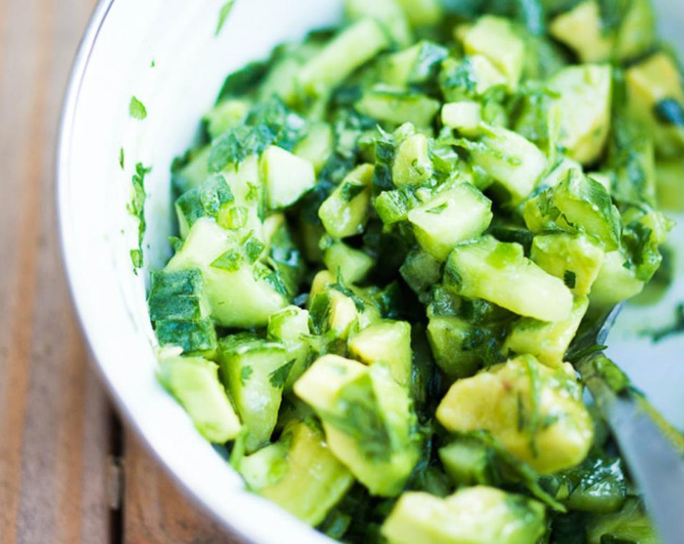 step 5 Make the salsa, in a medium bowl, mix the Cucumber (1 cup), Fresh Cilantro (2 Tbsp), zest and juice of the Lime (1), Jalapeño Pepper (1/2), Olive Oil (1/2 Tbsp) and Salt (1/4 tsp), and Ground Black Pepper (1/4 tsp). Then gently fold in the Avocado (1).