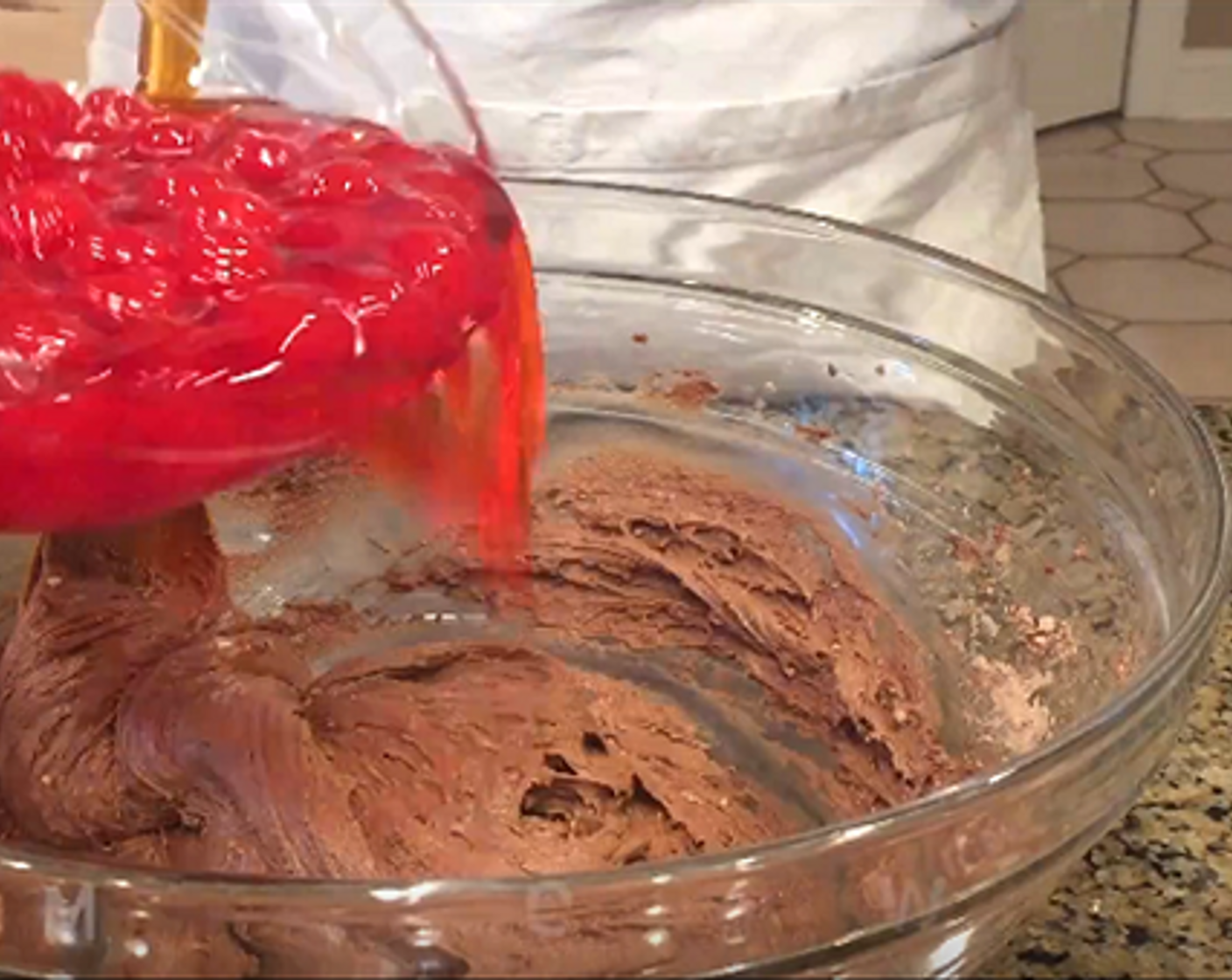 step 2 In a mixing bowl, mix Devil's Food Cake Mix (1 pckg), Eggs (2), Vegetable Oil (1/4 cup), Milk (1/4 cup), and Almond Extract (1 tsp) until well blended. Mix in Maraschino Cherries (2 1/4 cups) and its juices.