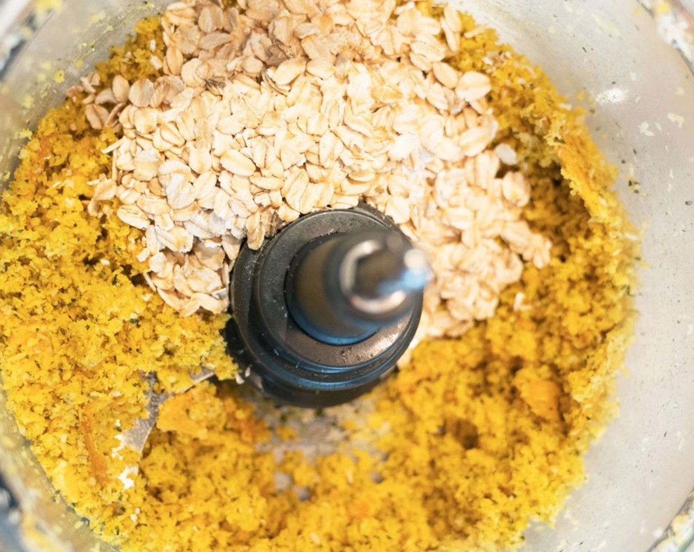 step 1 Place Unsweetened Shredded Coconut (1 cup), Old Fashioned Rolled Oats (1/2 cup), Dried Mangoes (1/2 cup), Hemp Hearts (4 Tbsp), Ground Turmeric (1 tsp), and 2 Tbsp of Lemon Juice (1) into a high power blender and blitz until it forms a texture that you can roll into balls.