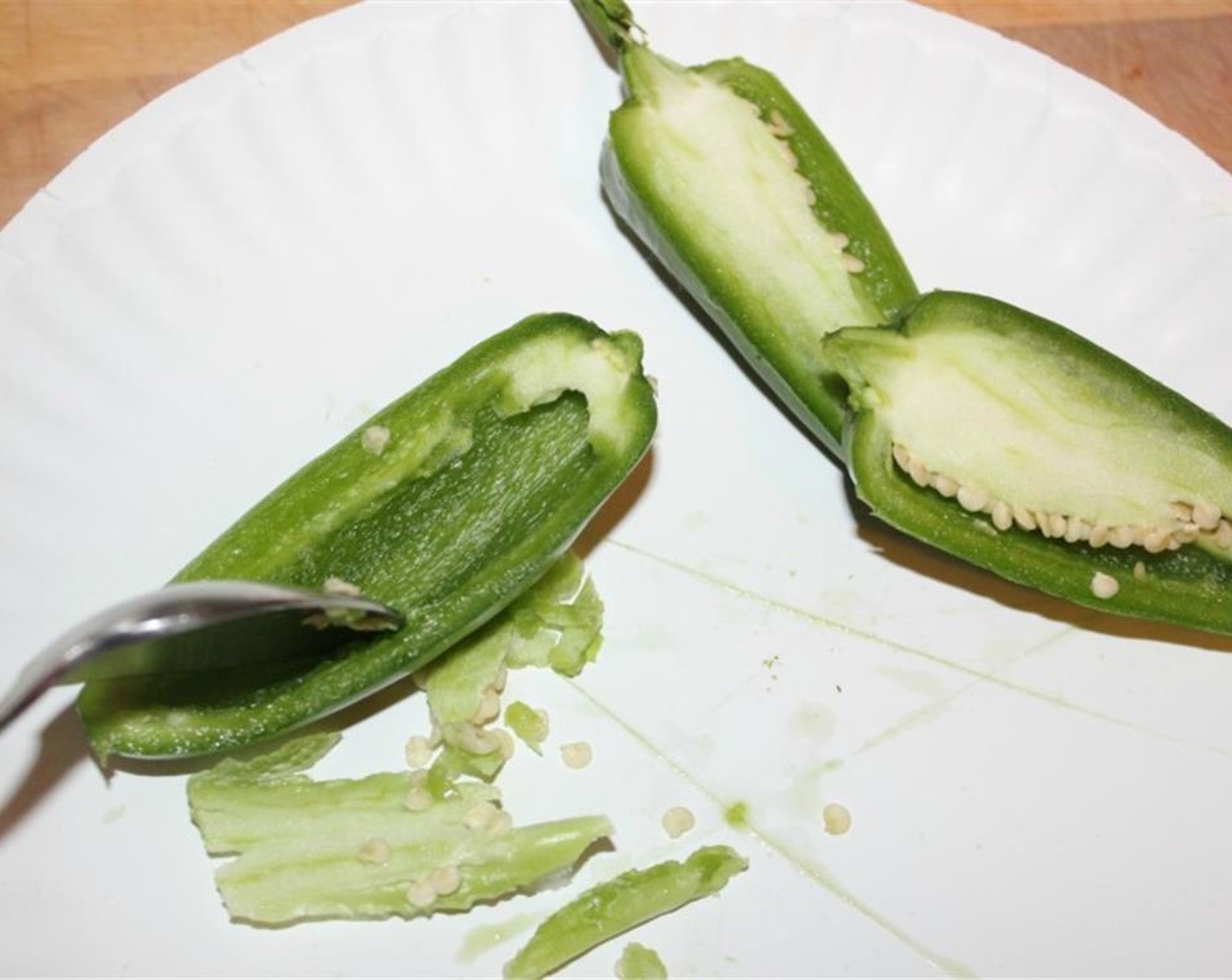 step 1 Slice up all the Jalapeño Peppers (15) making sure to be very careful when handling hot peppers. Scoop out the seeds and veins.