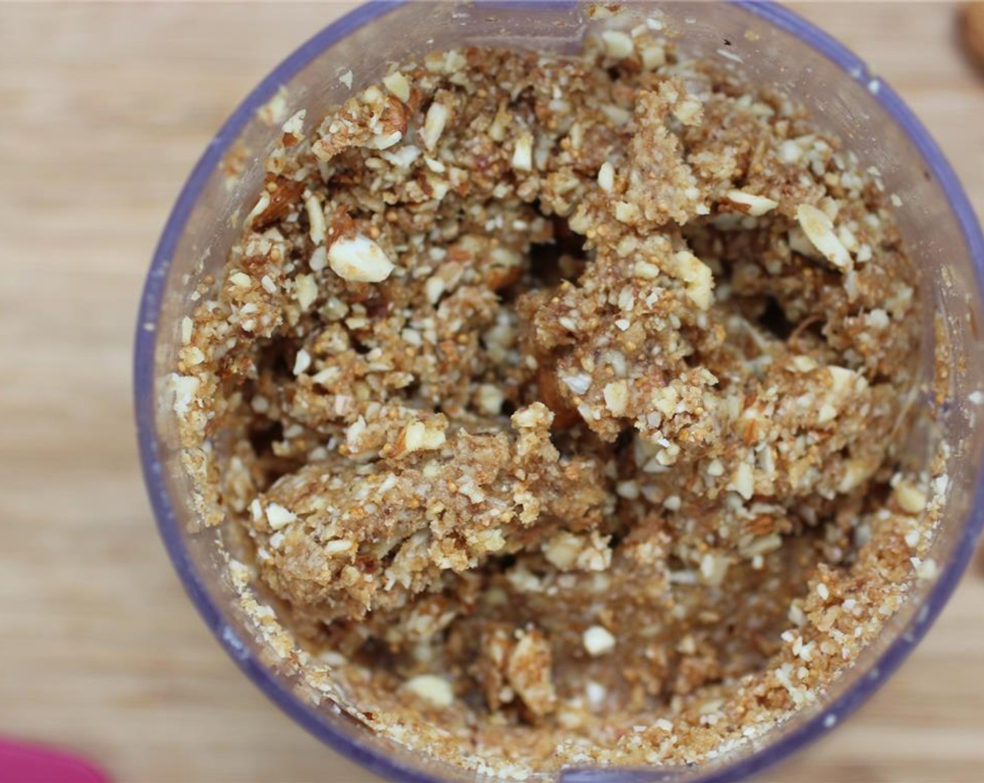 step 2 To make the crust, add Raw Almonds (1 cup), Dried Fig (3/4 cup), Water (1/2 Tbsp), and dates to a food processor and mix to combine.