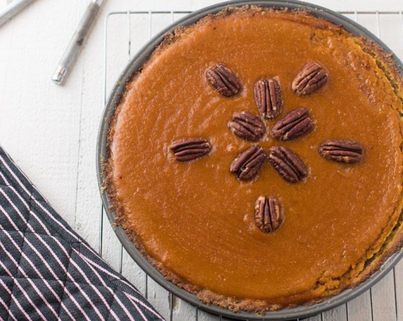 step 8 Top pie with the toasted pecans and let cool completely before serving.