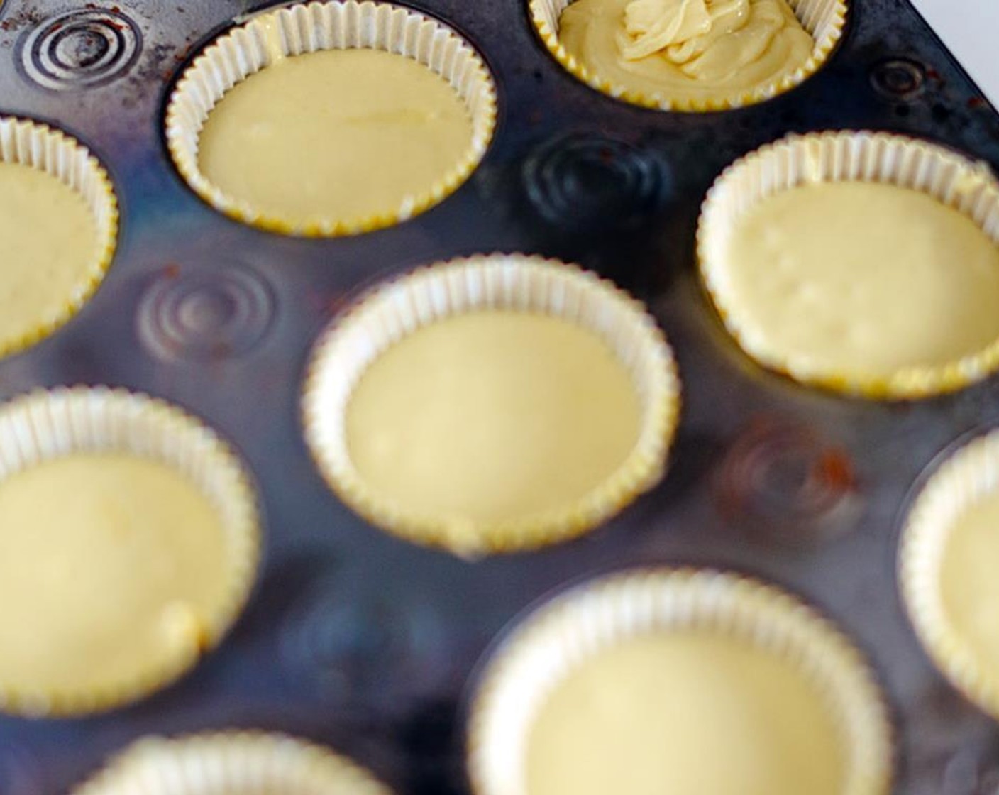 step 4 Stir in 1/3 cup of coconut flakes. Pour the batter into lined cupcake pan. Bake for 30 minutes or until toothpick comes out clean. Allow cupcakes to completely cool to room temperature.