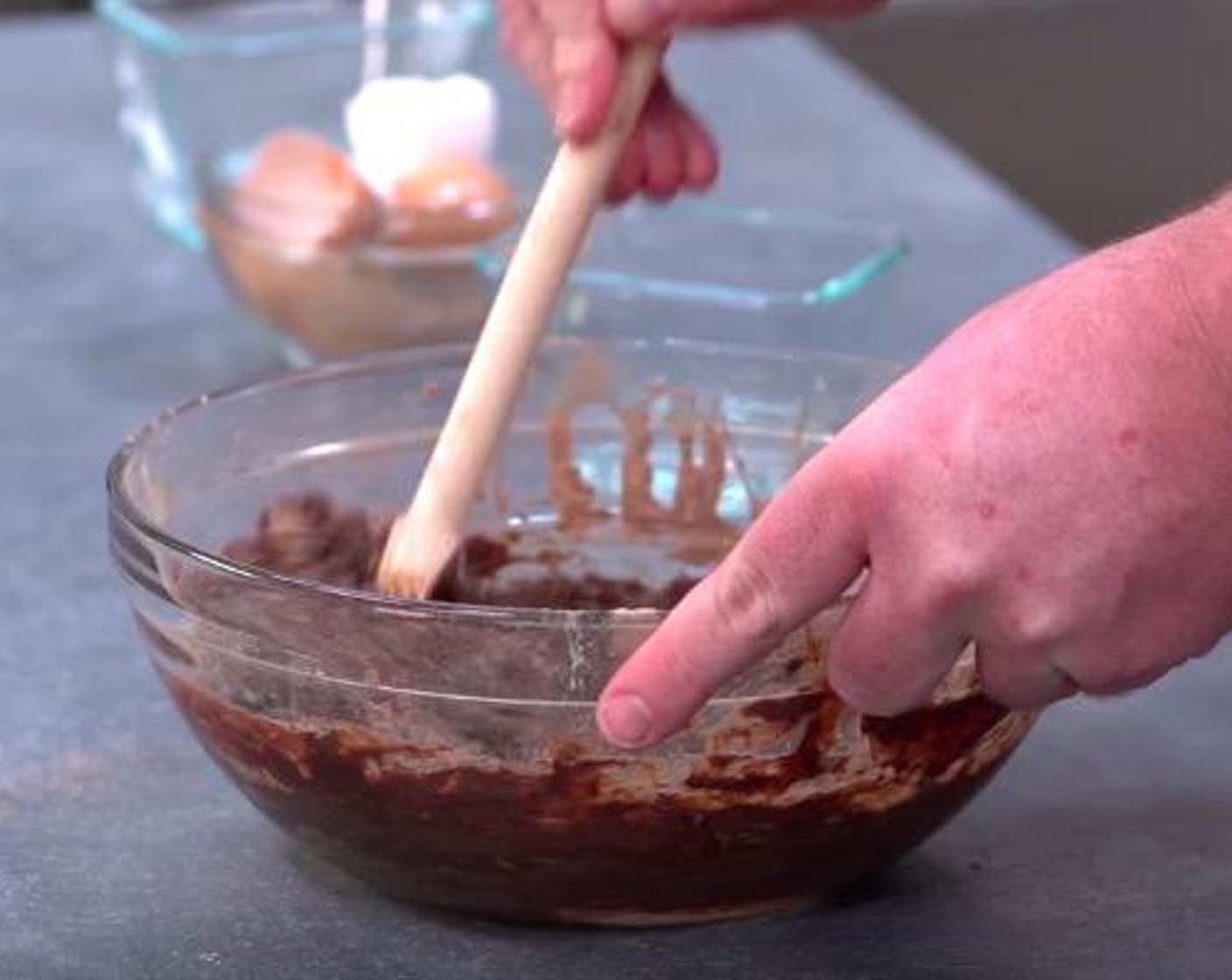 step 1 Put Caster Sugar (1 1/4 cups), All-Purpose Flour (1 cup), Unsweetened Cocoa Powder (1/2 cup) into a mixing bowl and use a wooden spoon to mix it all together until it's combined. Add Butter (1/2 cup) and Eggs (4) into the mixing bowl and mix everything together until smooth.