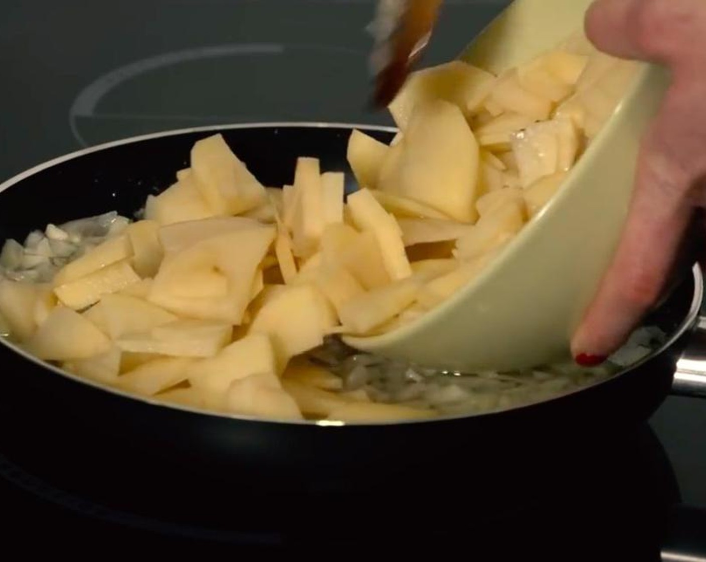 step 2 Warm the Sunflower Oil (as needed) and add the Garlic (to taste), Onion (1), and the potatoes, when the potato gets soft drain carefully and season it with Salt (to taste).