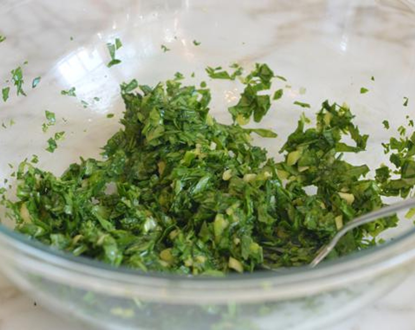 step 2 In a bowl large enough to hold all of the ingredients, beat the Egg (1). Add the Fresh Baby Spinach (2 3/4 cups), Scallion (1 bunch), and Garlic (3 cloves) and stir until evenly combined.