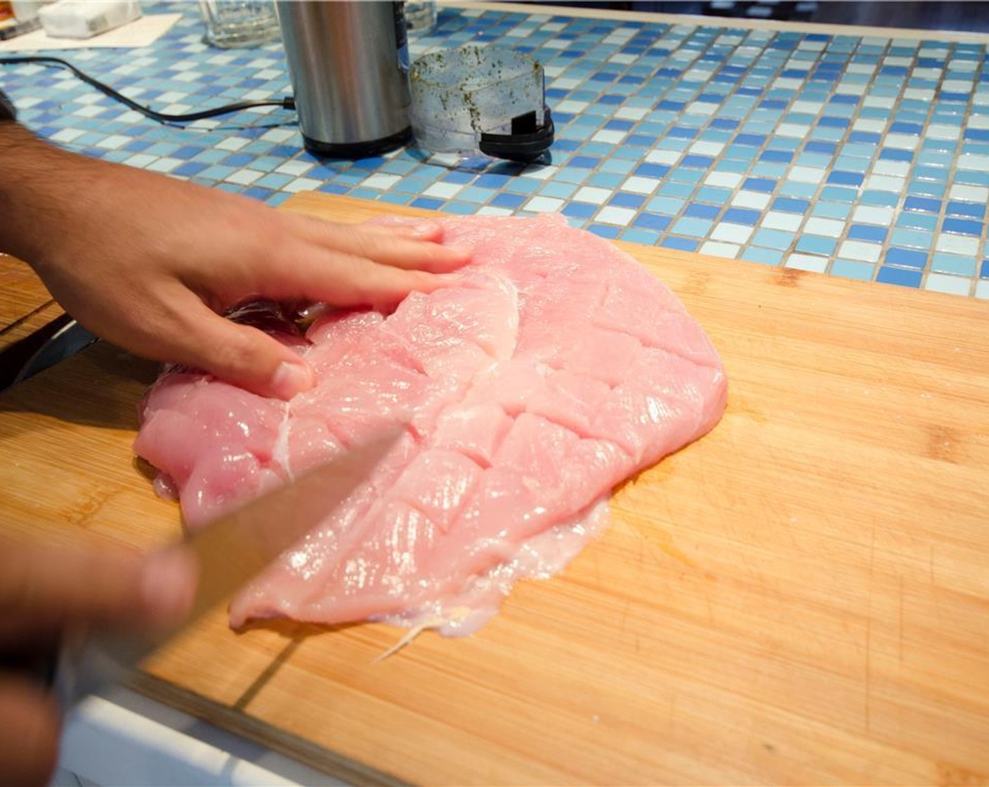 step 4 Fold out the breast flat so that it’s now twice as large, and half as thick. Repeat with the second breast. Cut a series of parallel slashes at 1-inch intervals in the turkey meat about 1/2-inch deep. Don't cut all the way through!