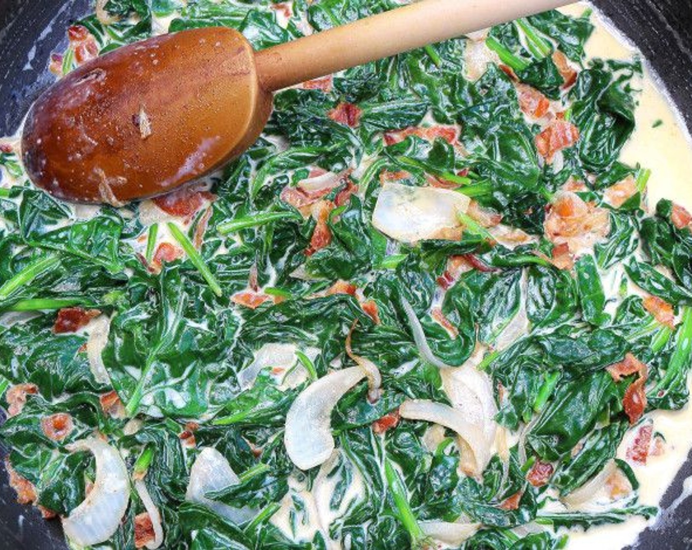 step 7 Then add additional Spinach Leaves (7 1/2 cups) and Heavy Cream (1/3 cup), simmer 1 minute, remove from heat.