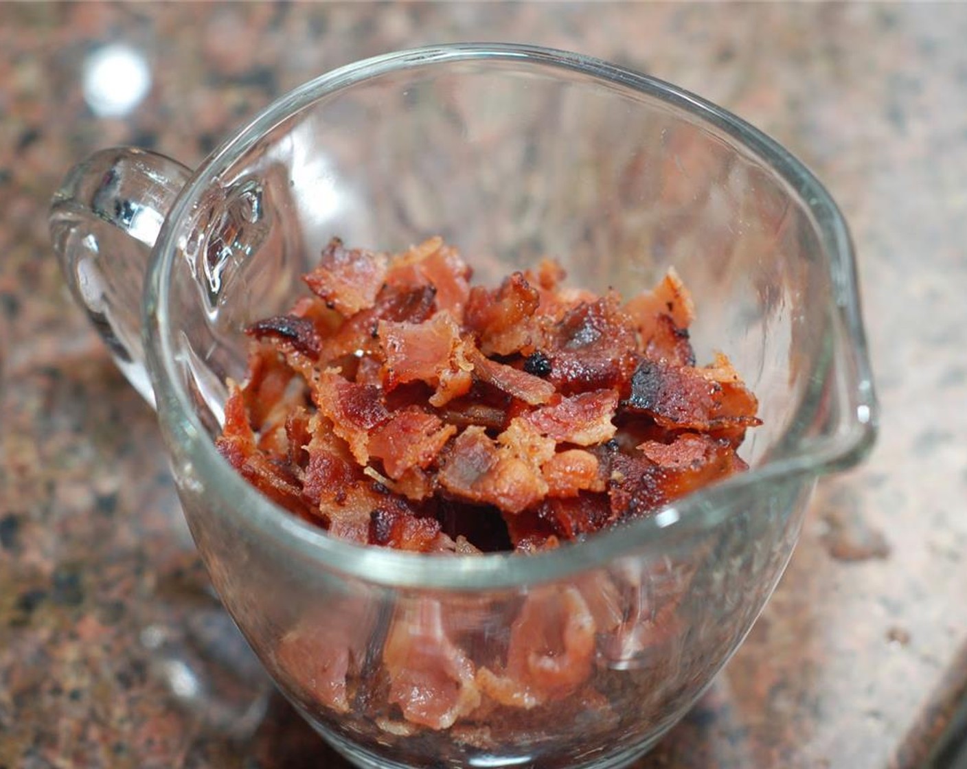 step 1 Cook the Bacon (8 oz). When cool enough to handle, crumble the bacon into small pieces.