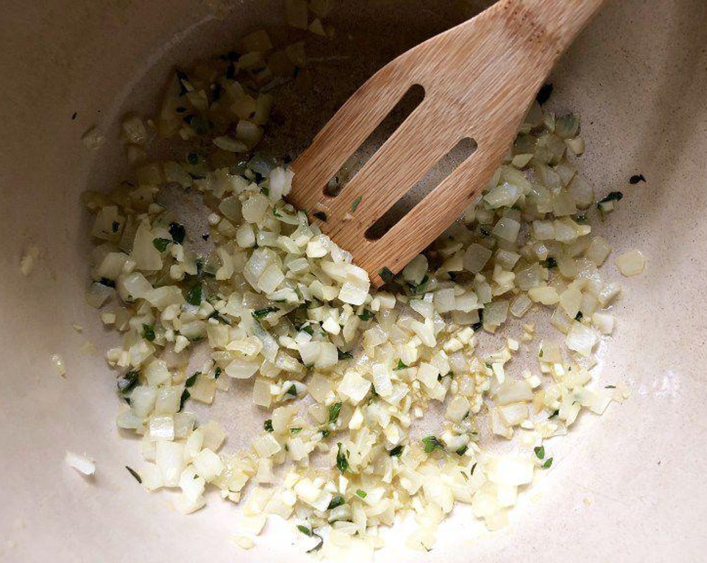 step 2 Add Fresh Oregano (1/2 Tbsp) and Garlic (4 cloves) to the pot. Sauté for 1 more minute.