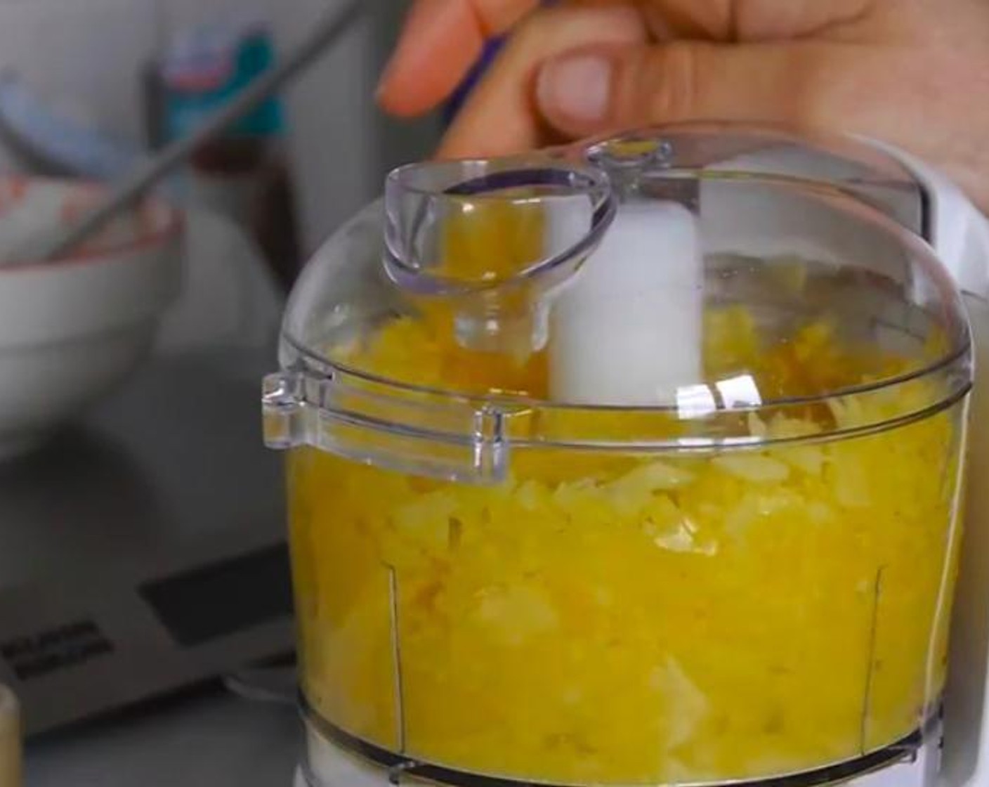 step 6 In a blender or food processor blend the Mangoes (1 1/2 cups) until a smooth pure. Add the gelatin to the mango and blend again until both ingredients are well combined and set aside