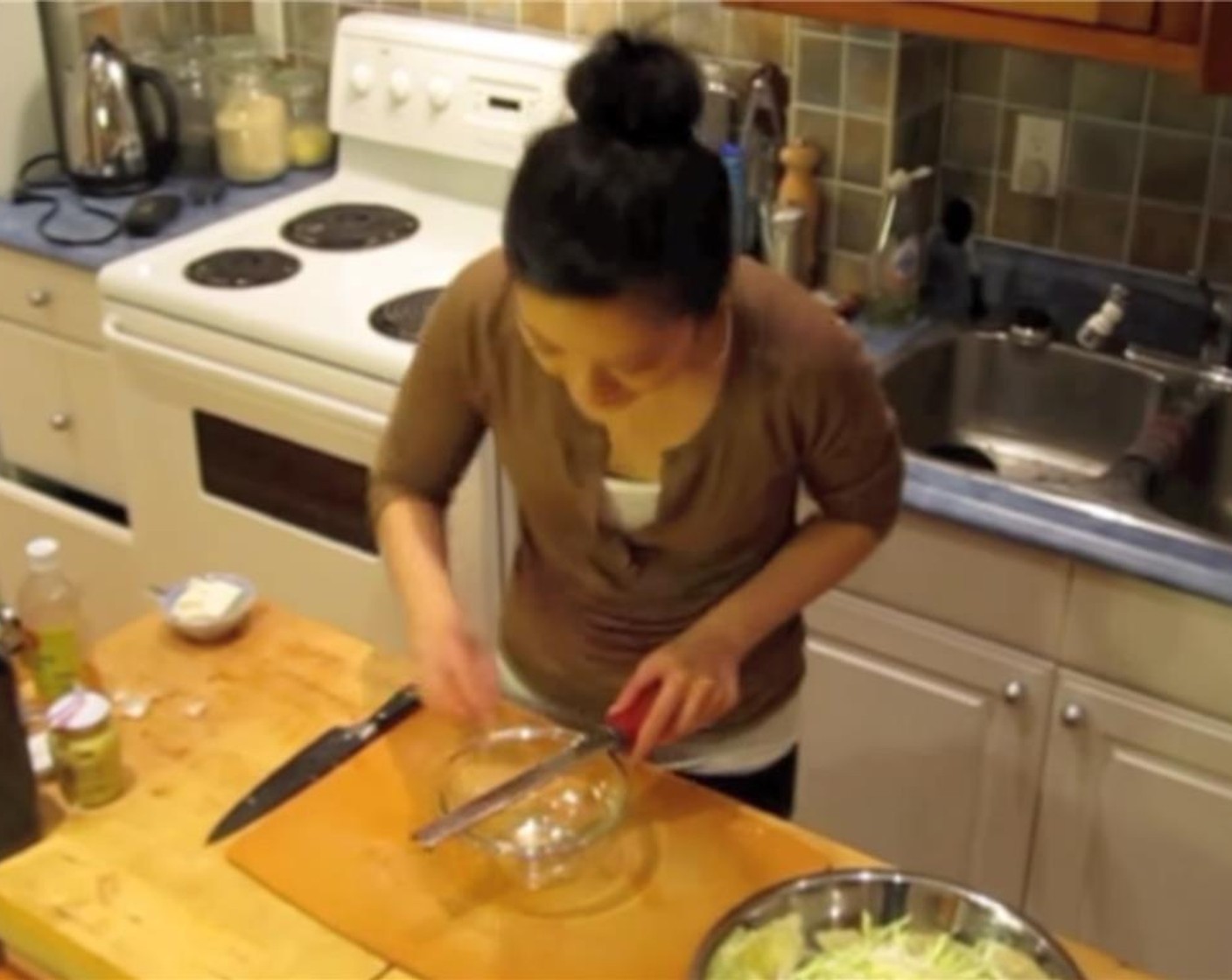 step 4 To make the dressing, grate the Garlic (1 clove) into a small bowl.