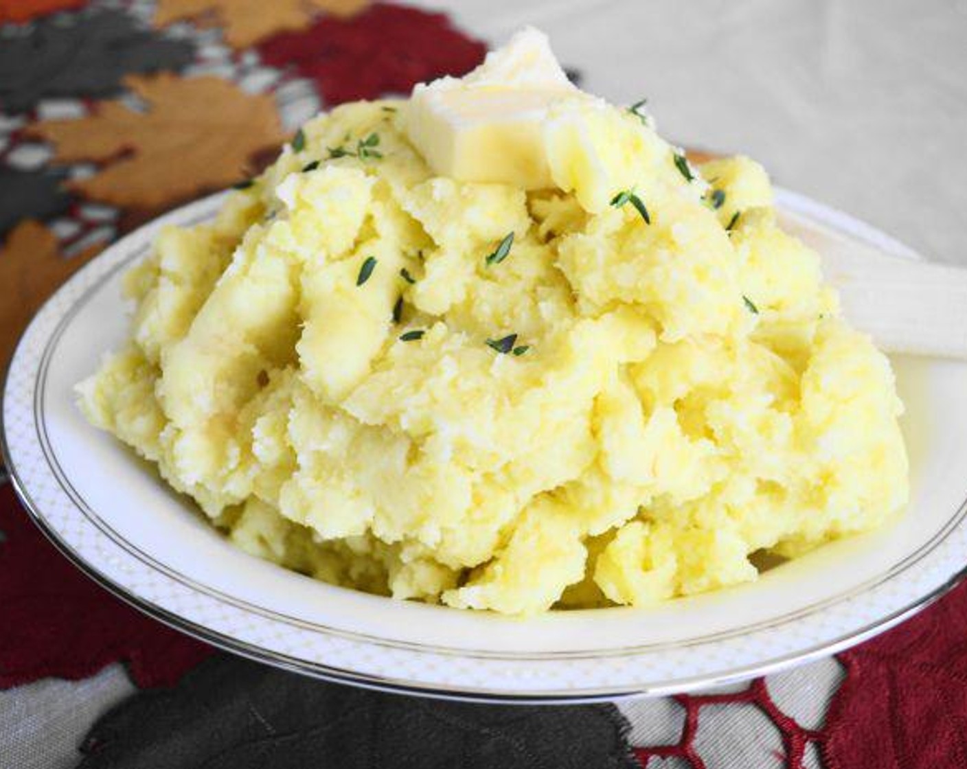 step 5 Scoop the mashed potatoes into a big serving bowl, then top it with a pat of butter and a big sprinkle of Fresh Herbs (1 pinch). Serve immediately and enjoy!