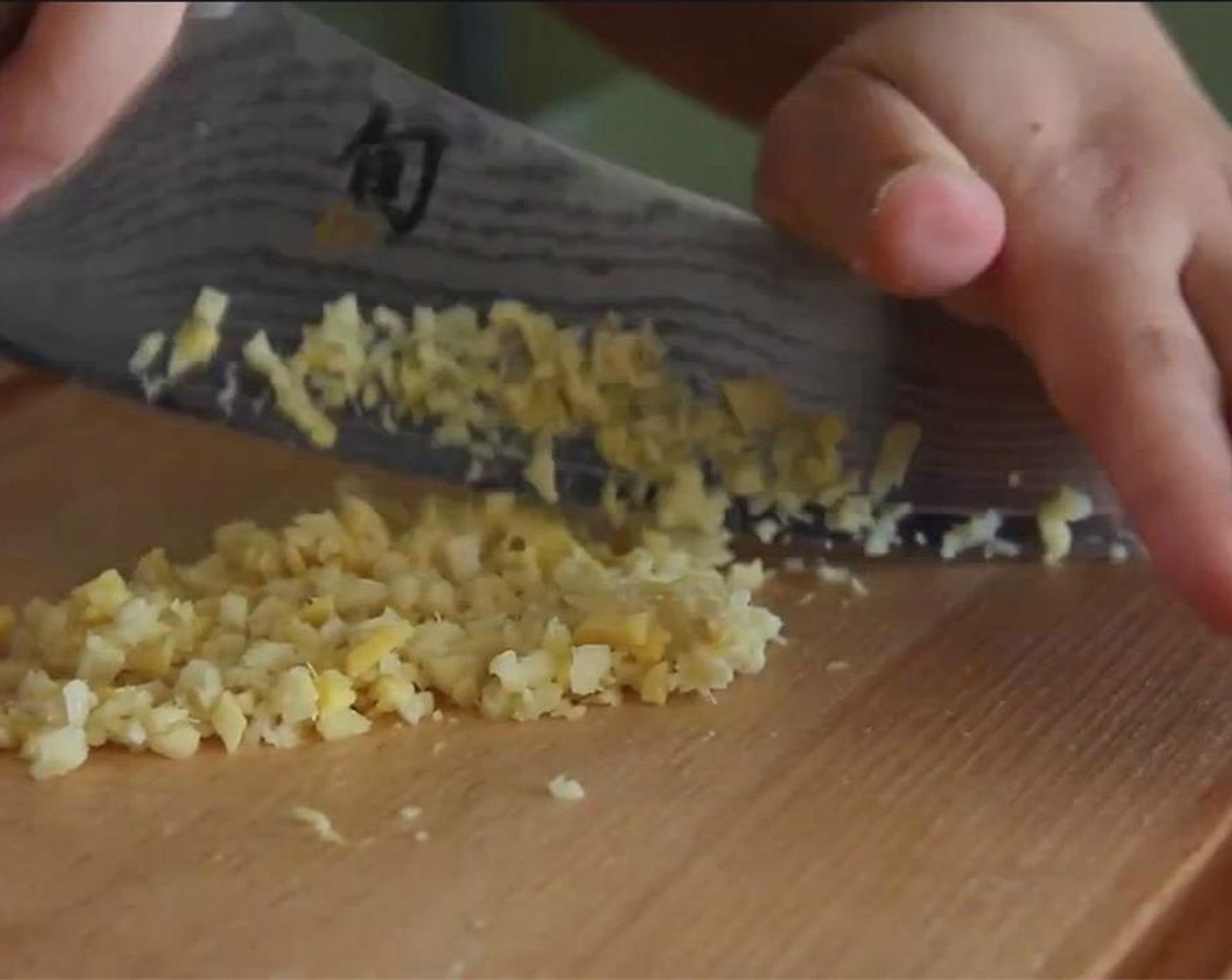 step 4 Peel and chop up the Garlic (5 cloves) and Fresh Ginger (2 Tbsp).