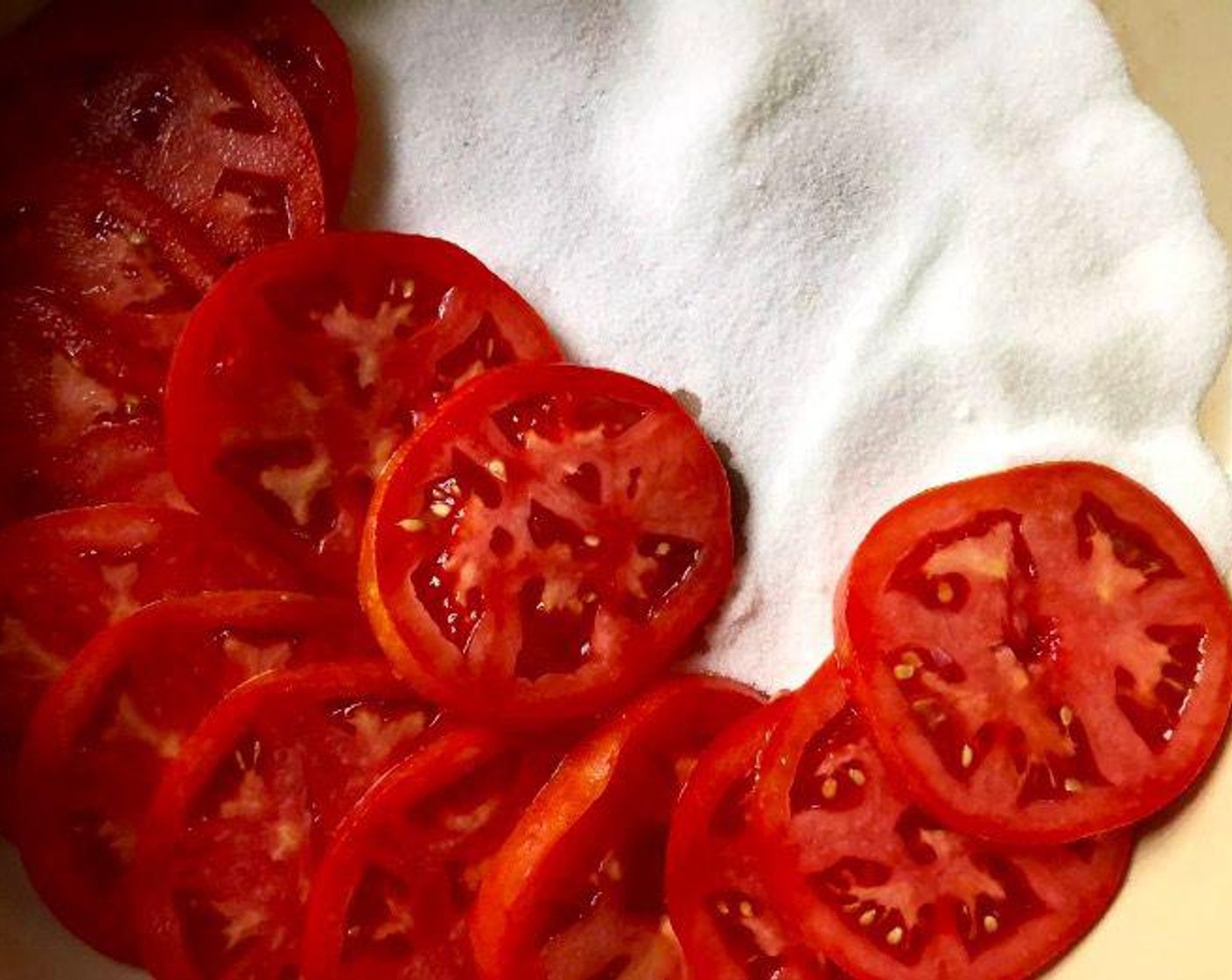 step 1 Pour Granulated Sugar (2/3 cup) over the base of a 12-inch braising pan or large baking dish. Layer Beefsteak Tomatoes (3 1/3 cups), overlapping the slices, in the pan over the sugar.