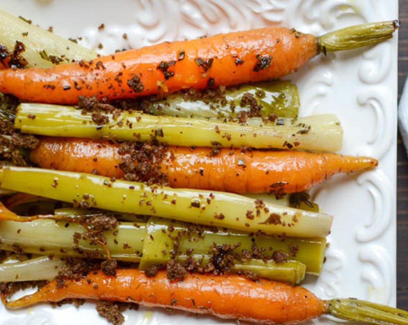 step 7 Transfer the vegetables to a serving platter and spoon any braising liquid over them. Sprinkle with breadcrumbs and serve. Enjoy!