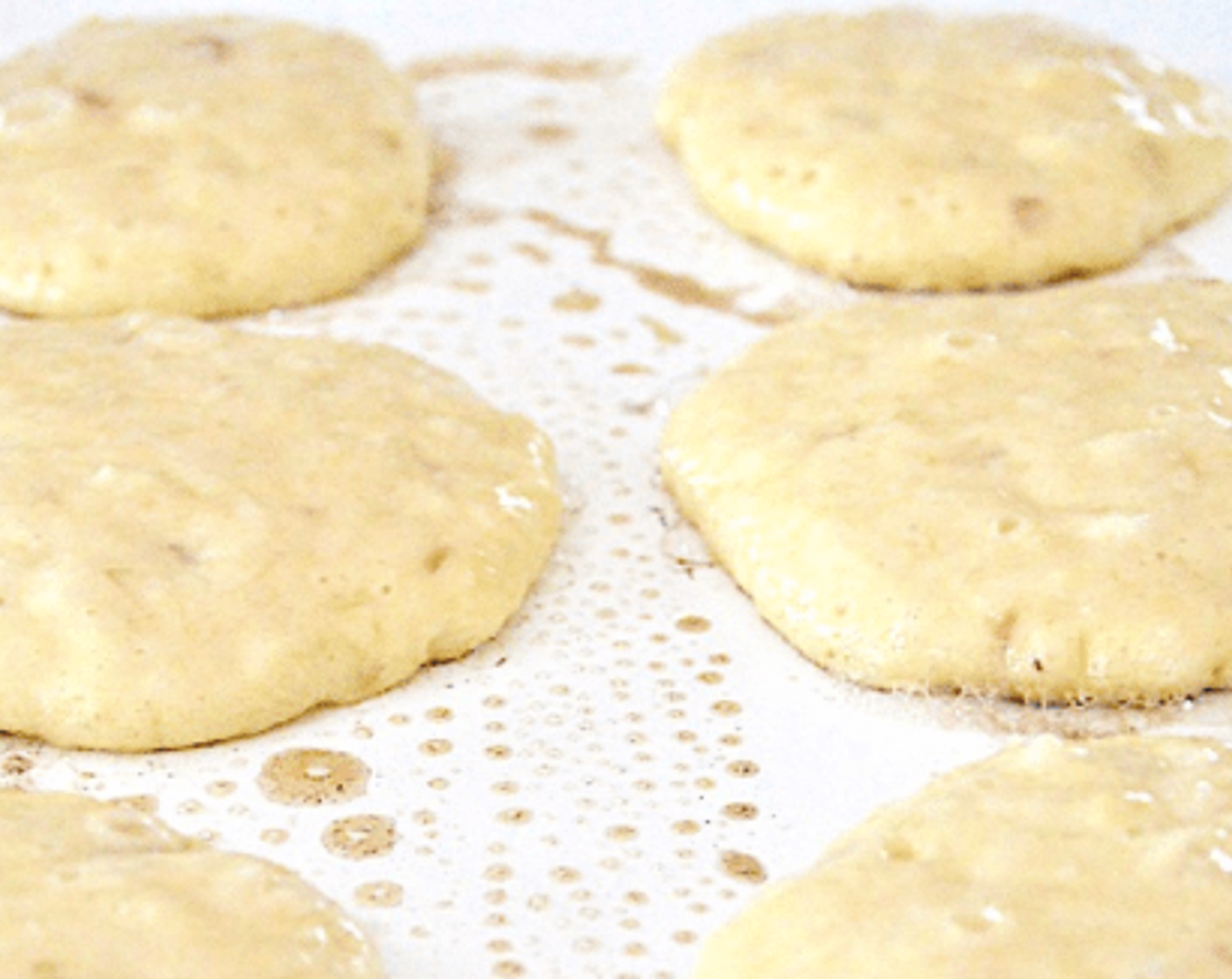 step 6 Preheat the electric griddle to 350 degrees F (180 degrees C) or the griddle pan over medium-high heat. Grease it with Butter (to taste), then cook off the pancake batter in batches in the size you want. They take about 4 minutes to cook on each side to become puffy and golden.