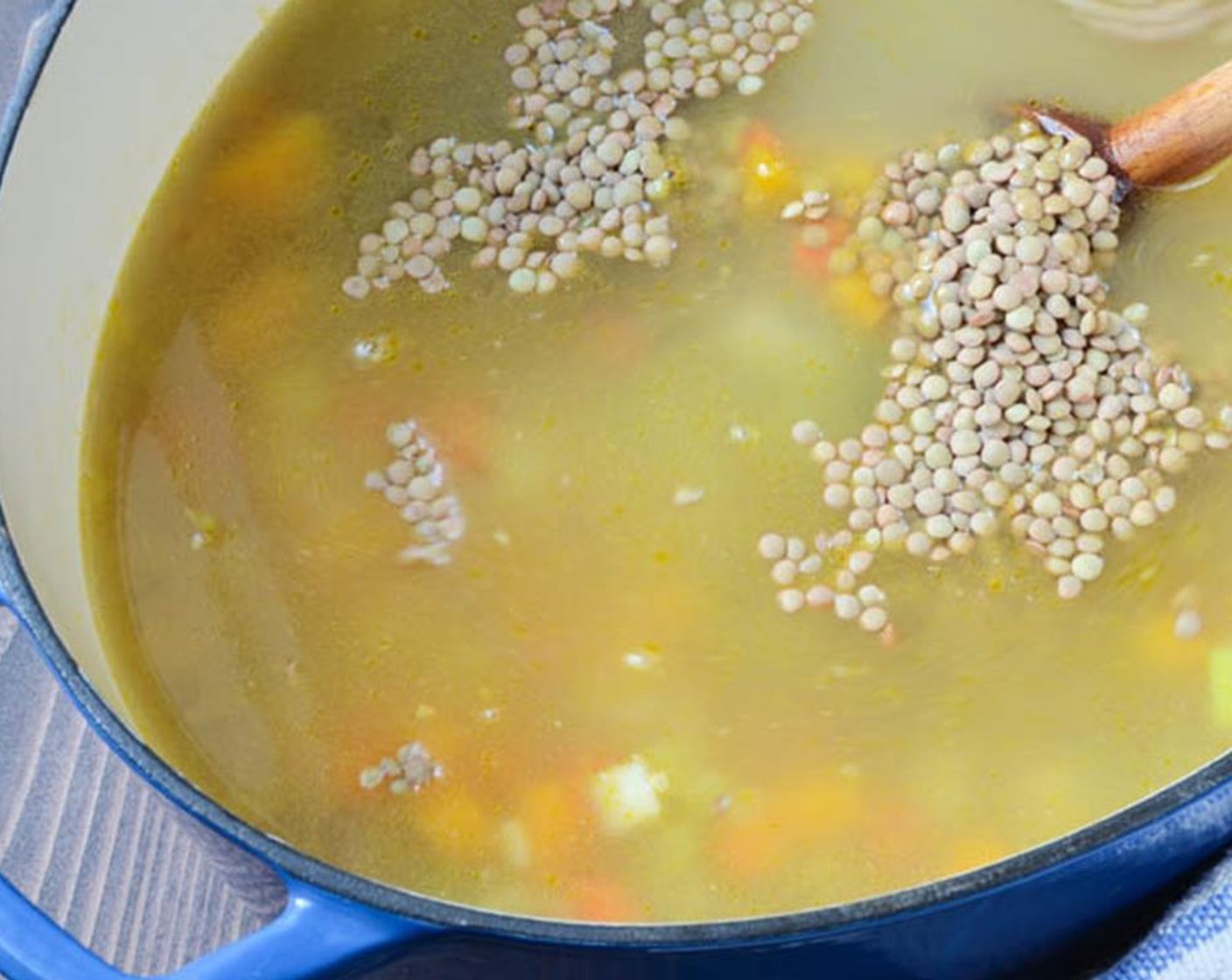 step 4 Pour in 4 cups of the Vegetable Broth (4 cups), 1 cup of the Water (2 cups) and the Bay Leaves (2).