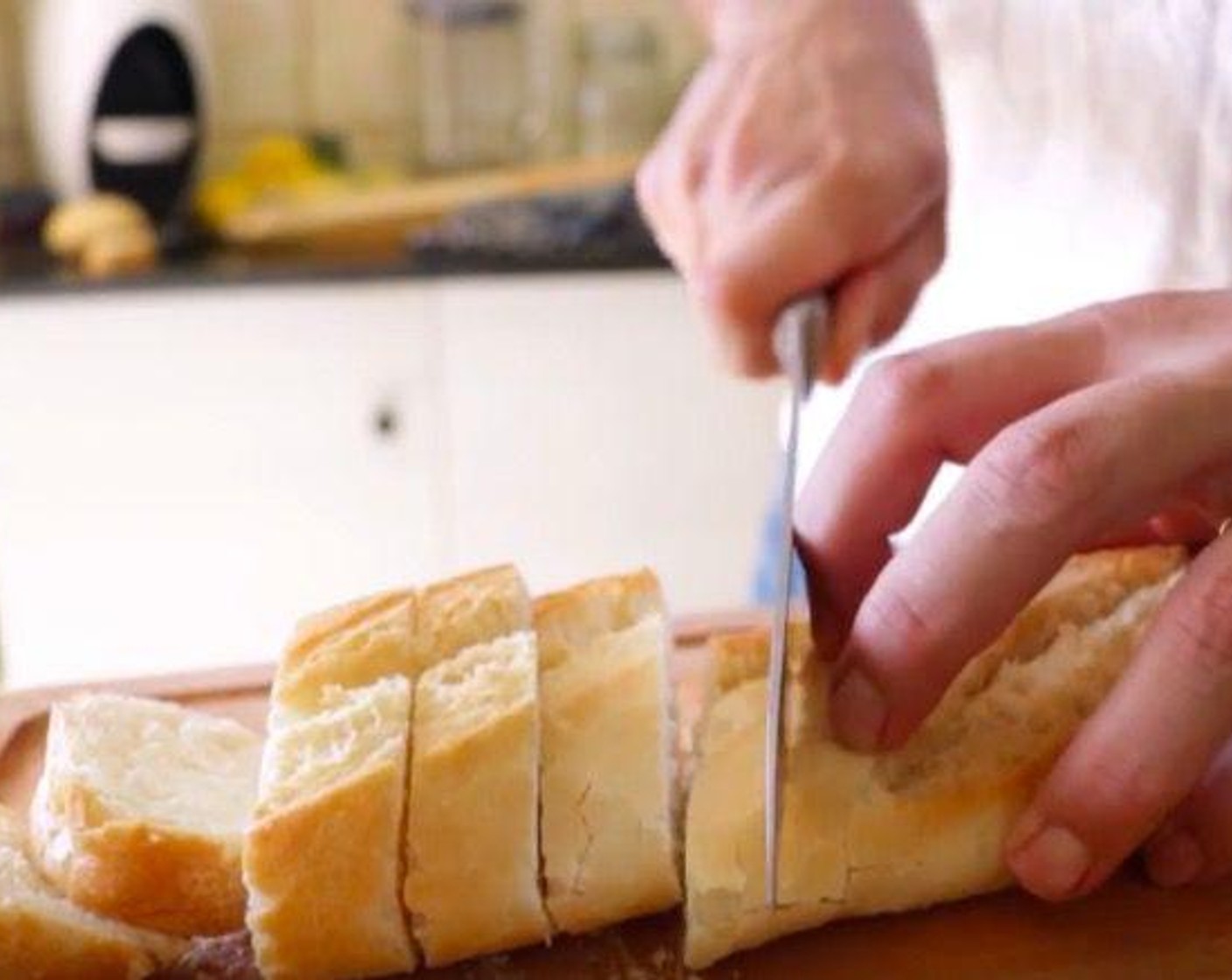 step 1 Cut Baguette (1) into diagonal slices that are 1-inch thick.