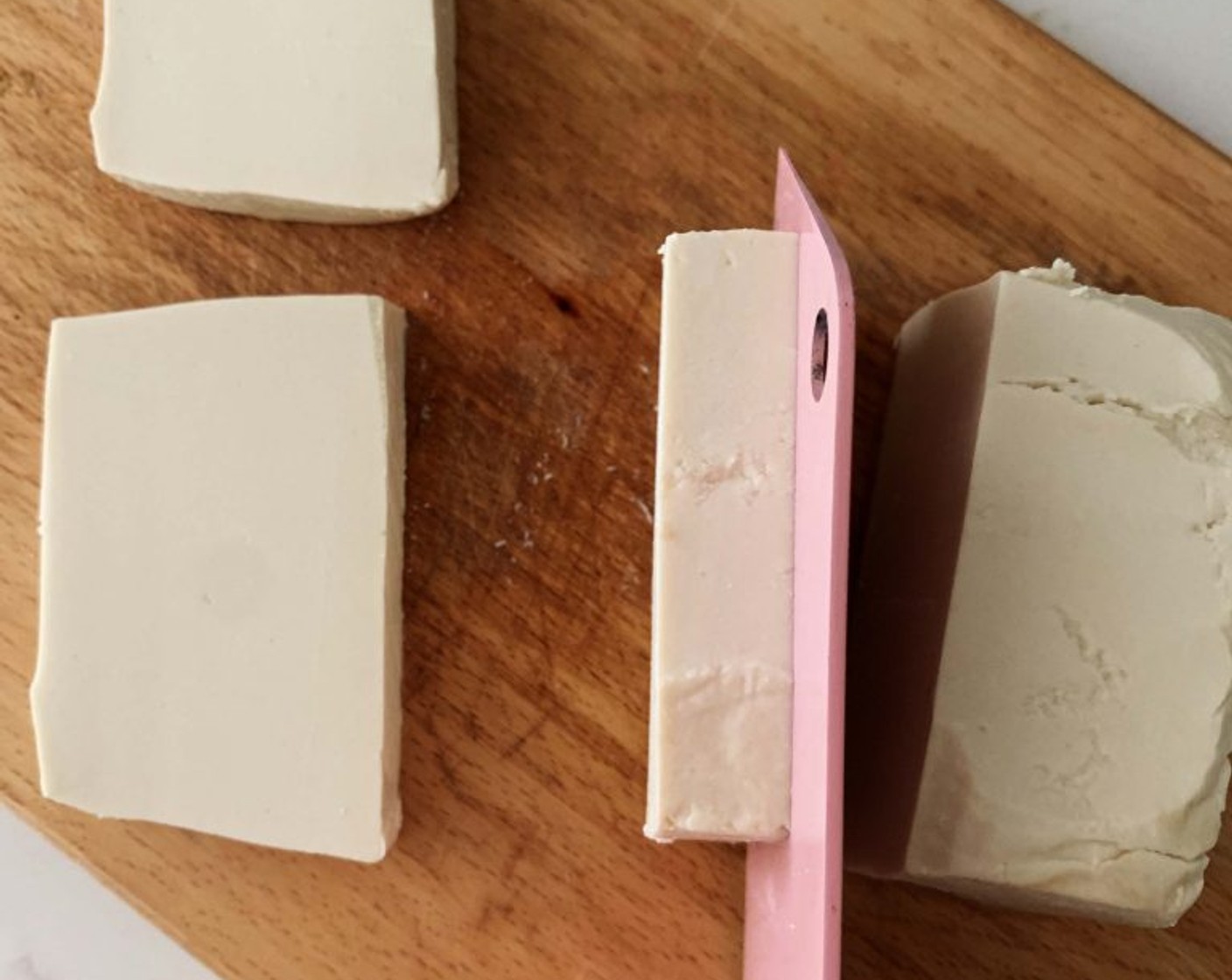 step 1 First, cut Firm Tofu (7 oz) into 1-1,5 cm thick slices, then cut each slice in half.