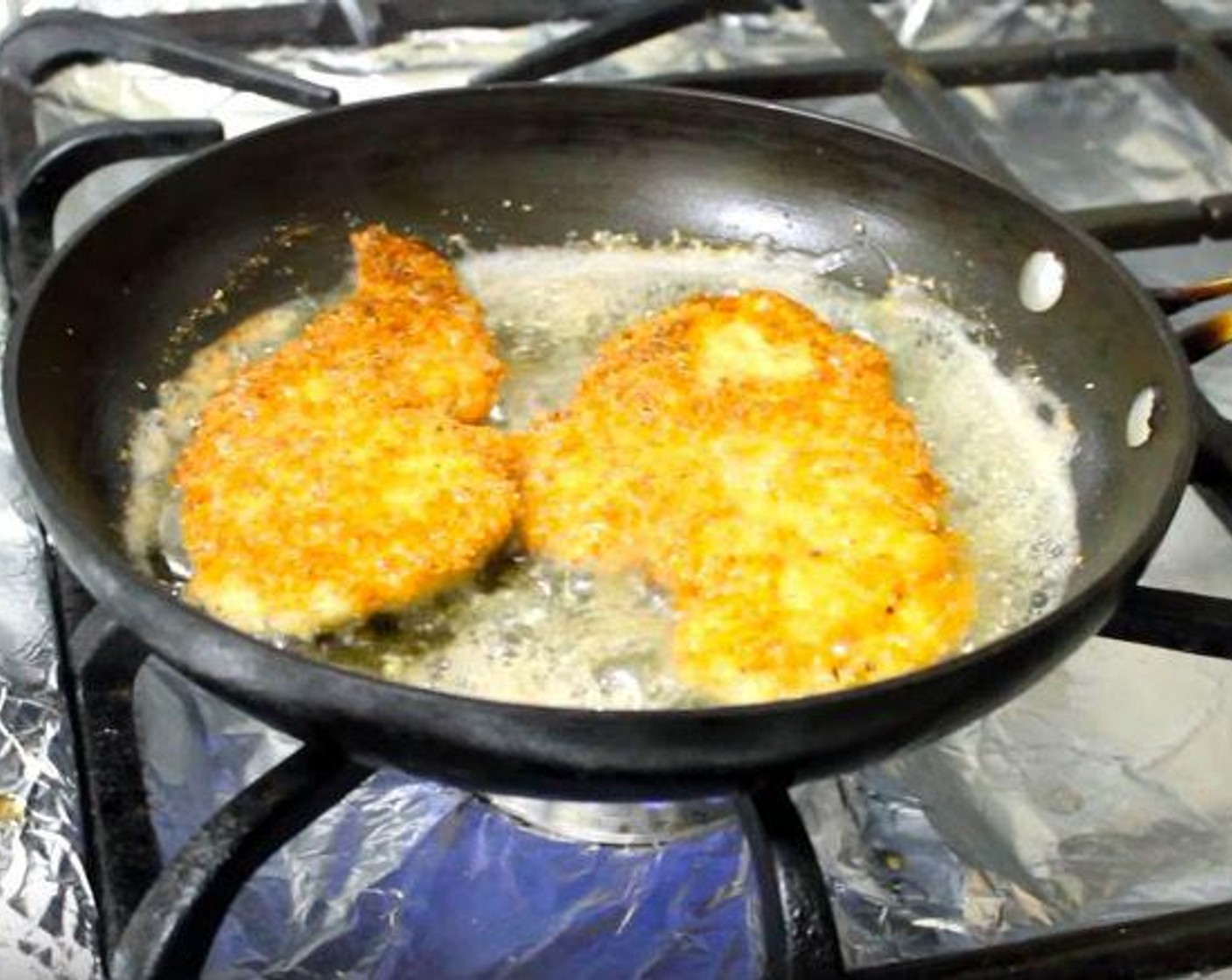 step 4 Flip and fry the chicken for another 3-4 minutes, or until golden brown.