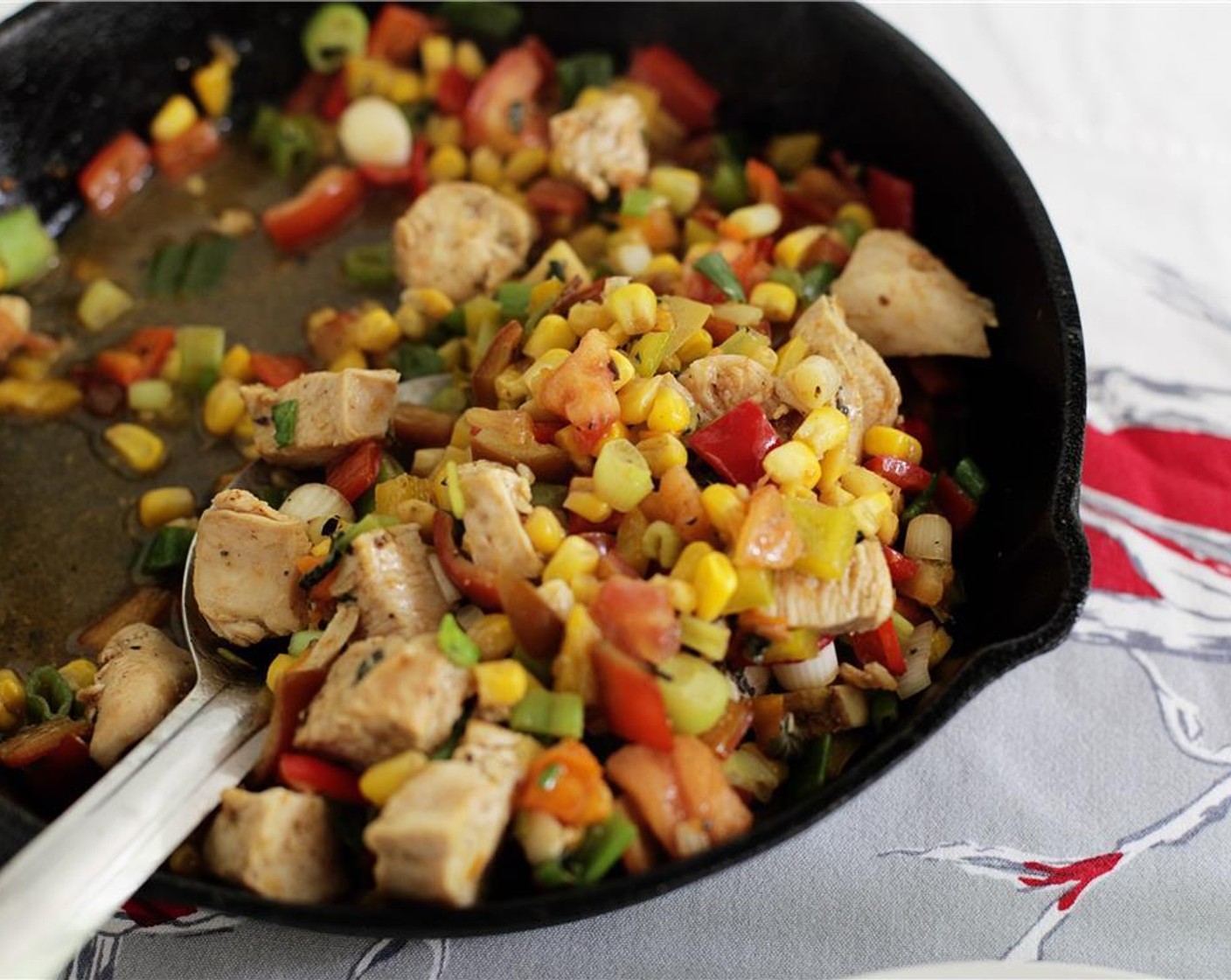 step 9 Add chicken, tomato, and scallion and cook for 2-3 more minutes, or until everything is heated through.