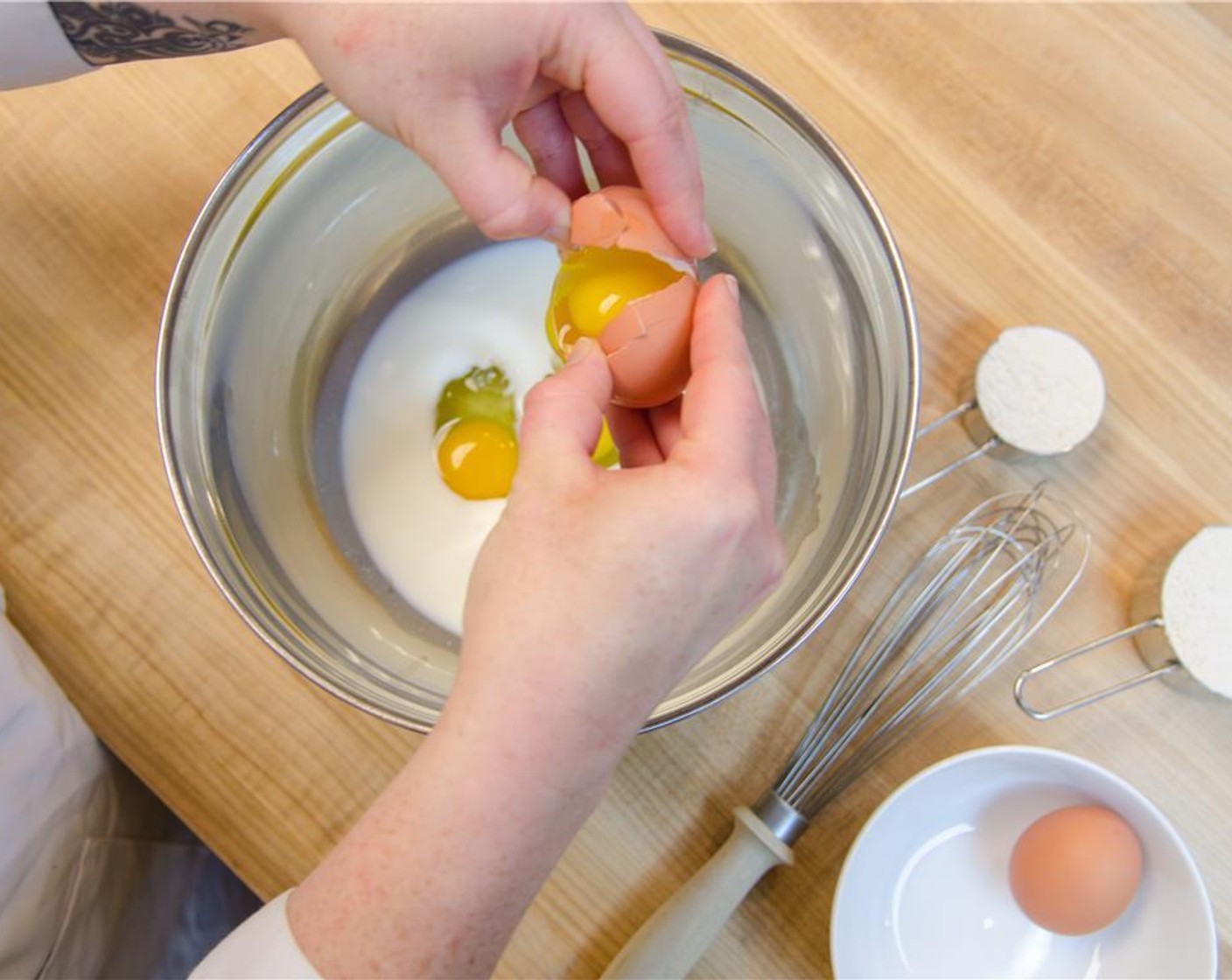 step 2 Crack and add in the Eggland's Best Classic Eggs (4).