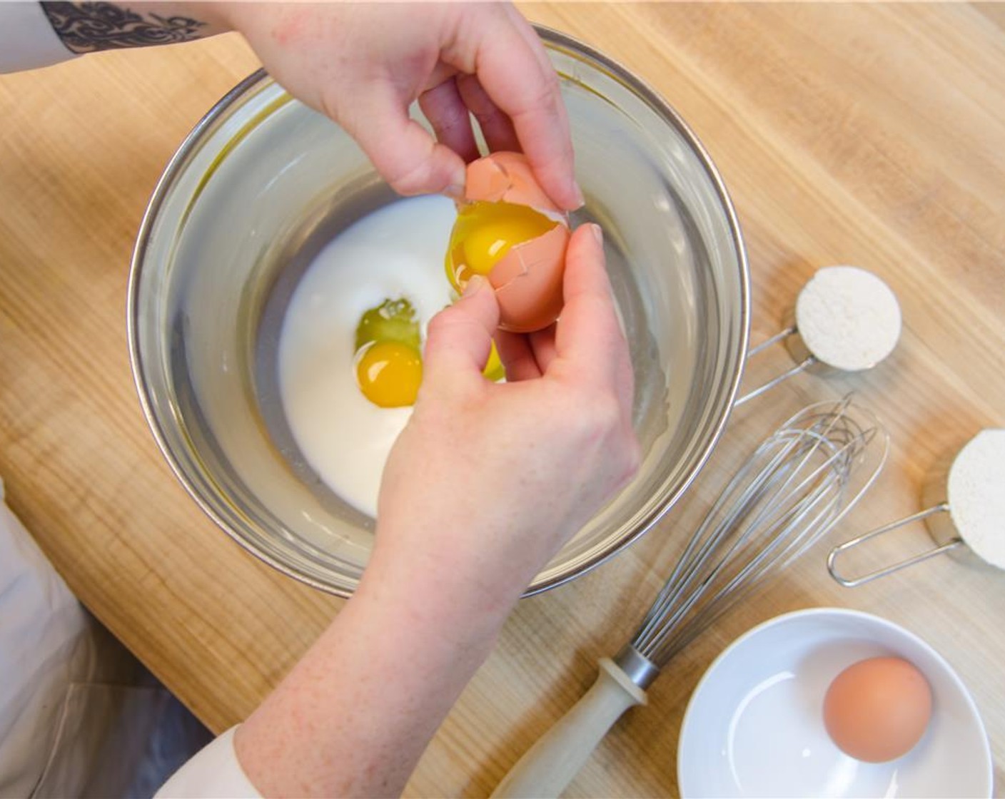 step 2 Crack and add in the Eggs (4).