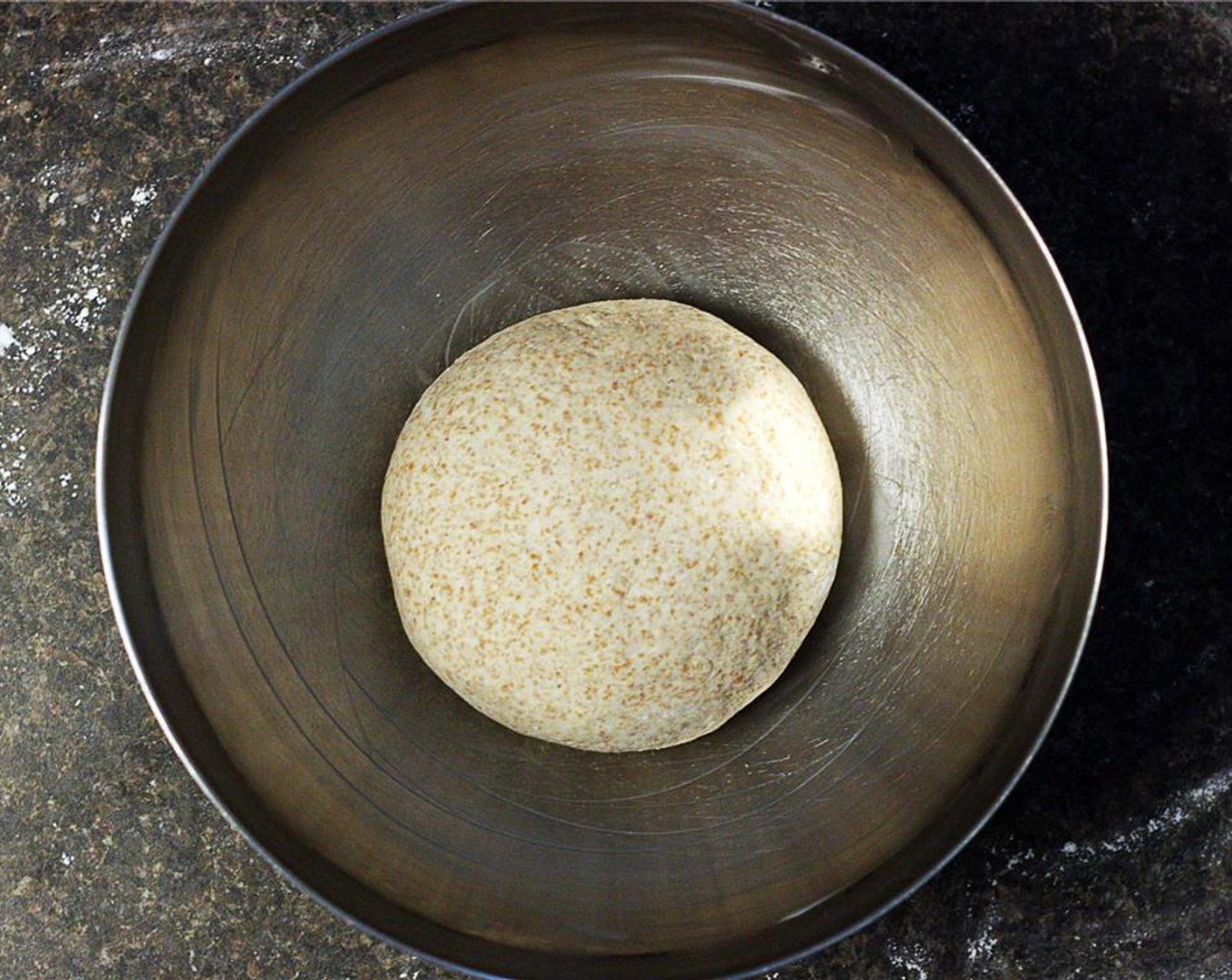 step 4 Clean out the mixing bowl and grease with Vegetable Shortening (to taste). Place the dough ball in the bowl and cover tightly with plastic wrap. Refrigerate overnight.