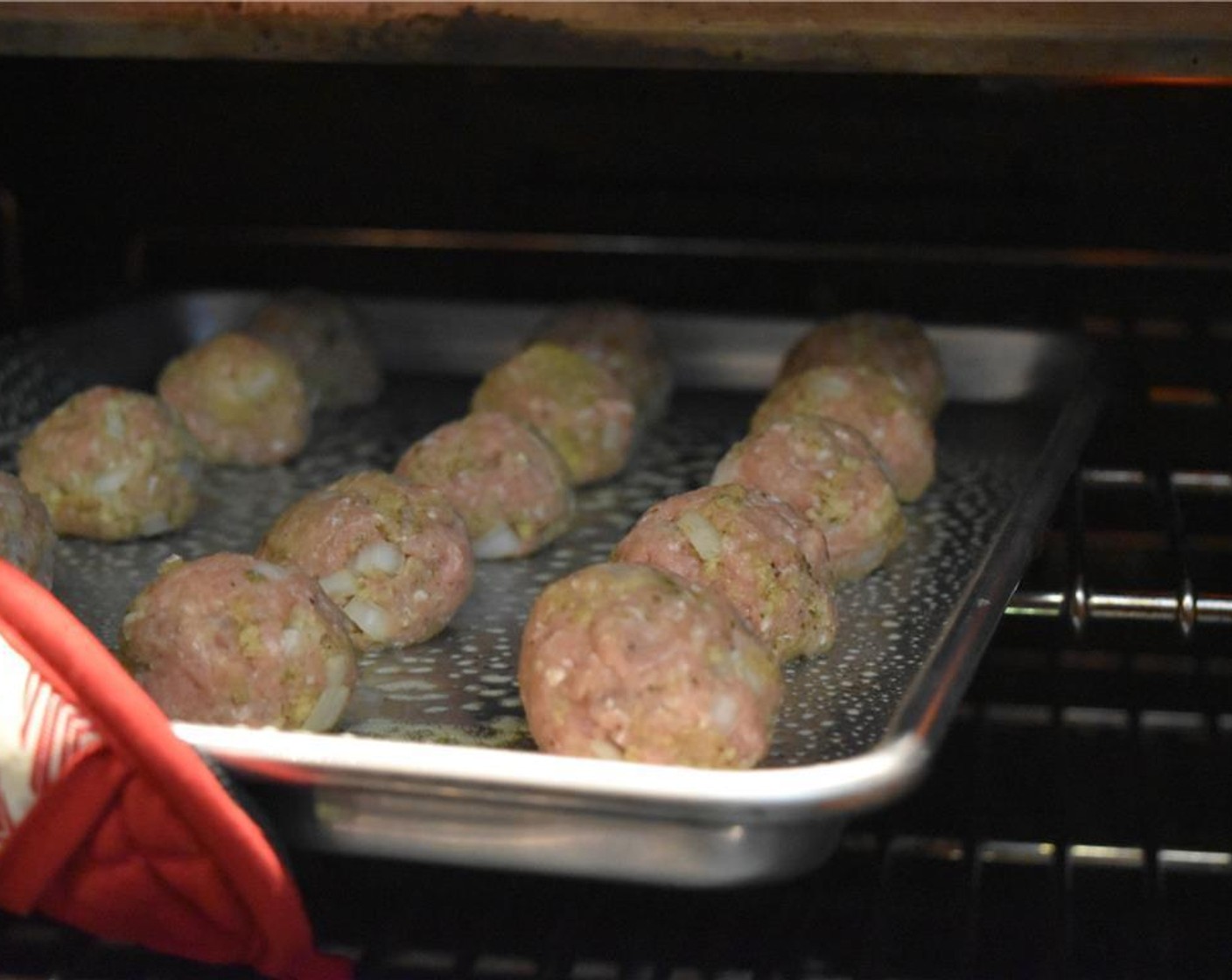 step 3 Combine using clean hands. Careful to not overmix! Roll the meat into golf ball-sized balls and arrange them on the baking sheet with at least 2-inches between each of them. Broil the meatballs for about 5 minutes, until the tops begin to brown and crisp.