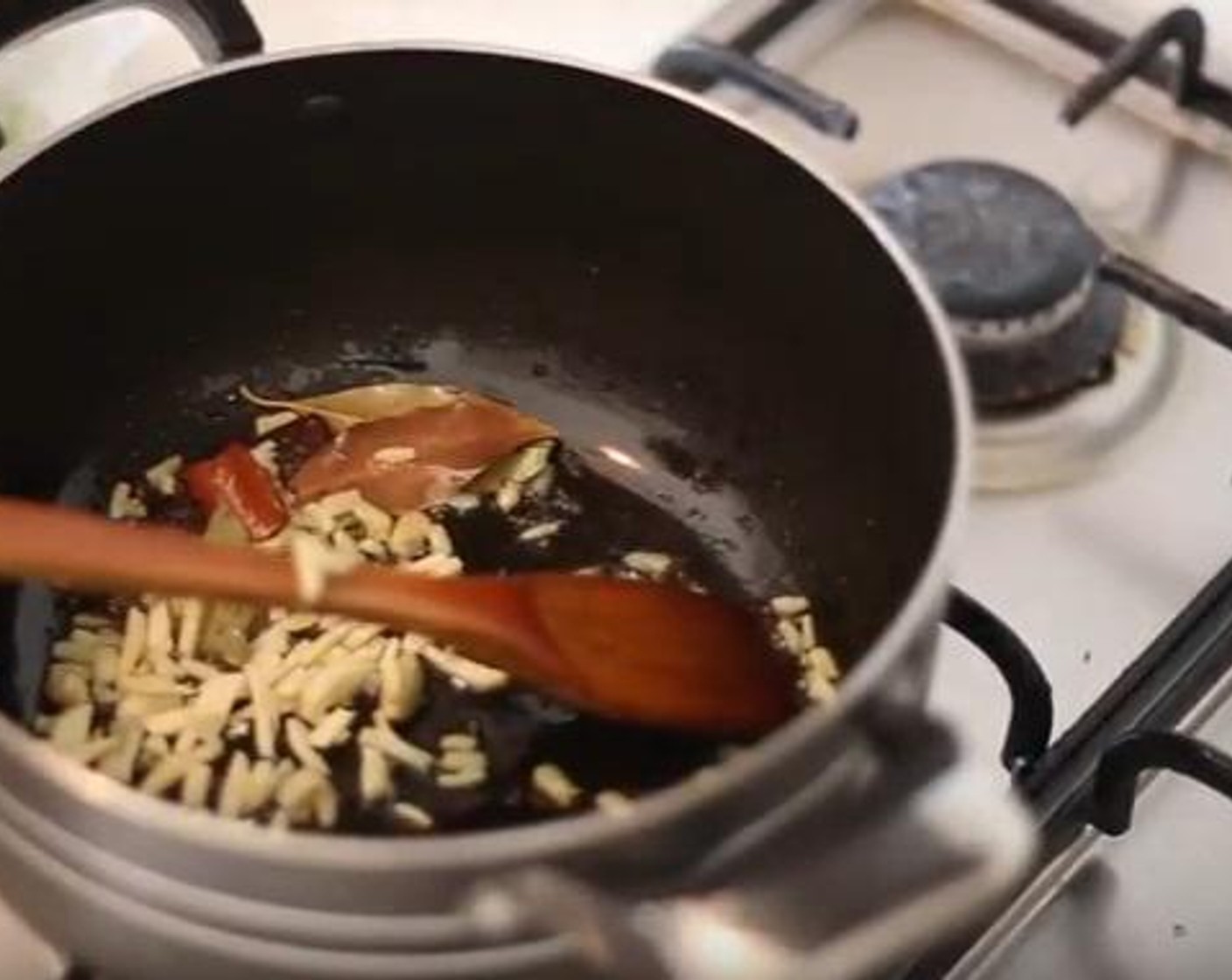 step 5 Inside a cooking bowl, add the Coconut Oil (0.5 oz), Mustard Seeds (1/2 tsp), Chinese Cinnamon Bark (1/2 tsp), Whole Clove (1/2 tsp), Bay Leaf (1/4 tsp), and Green Cardamom Pod (1/2 tsp) and mix everything under medium heat.