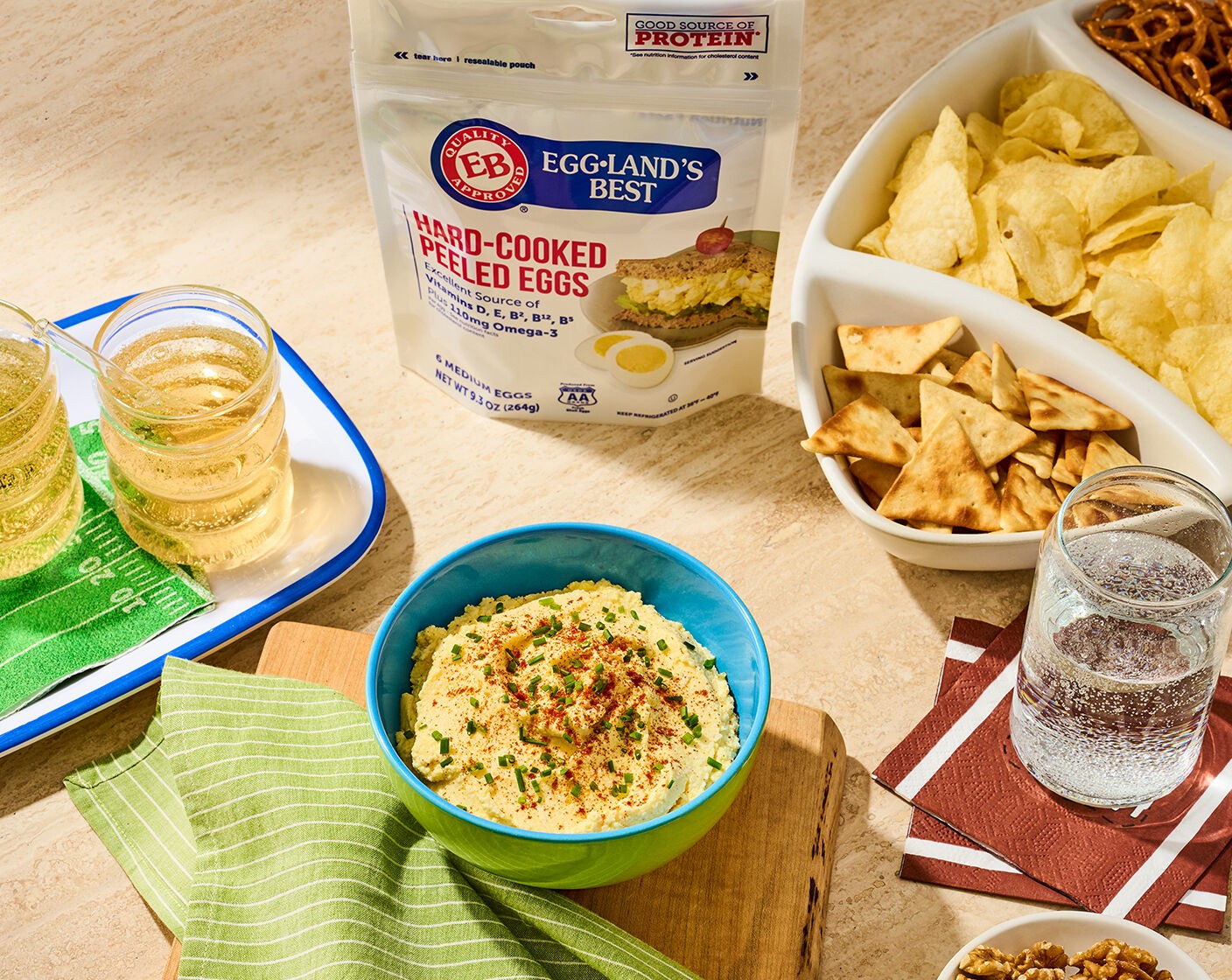 step 4 Transfer the dip to a serving bowl. Sprinkle the top with Paprika (1/2 tsp) and chopped Fresh Chives (1 tsp) for garnish. Serve with Fresh Vegetables (to taste), chips, or crackers.