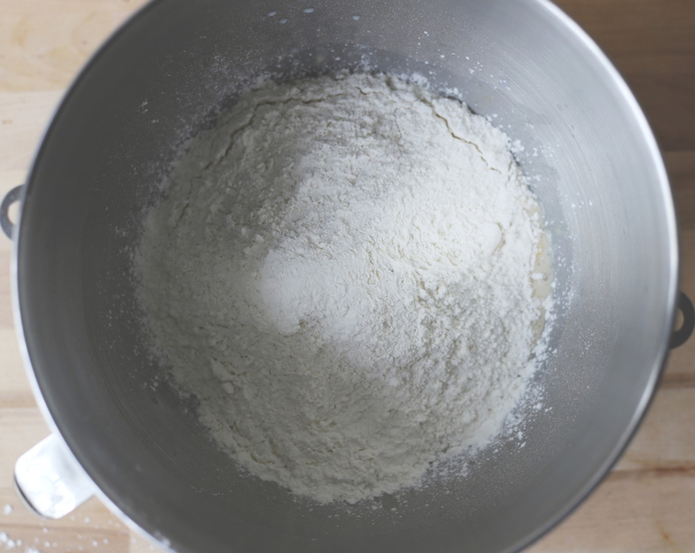 step 6 Add the All-Purpose Flour (2 3/4 cups) and knead on a medium-high speed, in the stand-mixer with the dough hook attached.