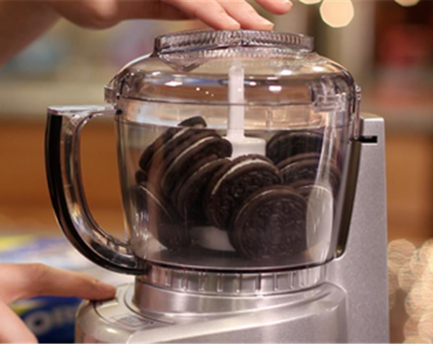 step 1 Grind up approximately 15 Oreo® Chocolate Sandwich Cookies (15 pieces).