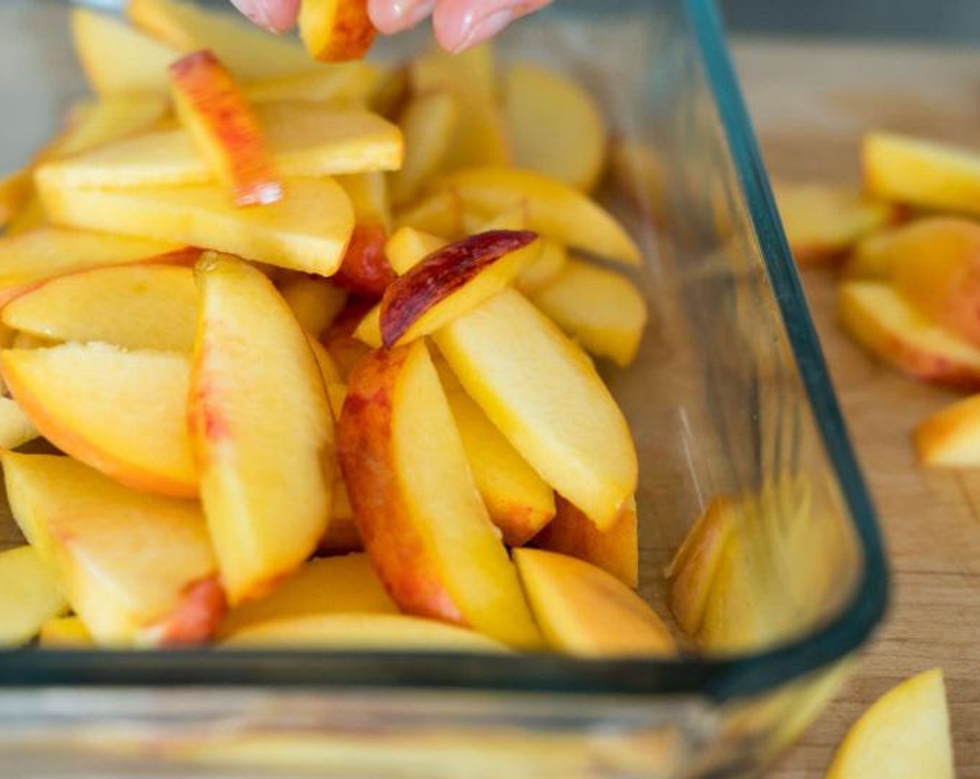 step 2 Place Peaches (4) in a baking dish. I used a 10 x 6 by 2" deep glass baking dish. However, don't feel restricted to this size. If you use a smaller dish and the crisp is deeper you might need to cook it a little longer.