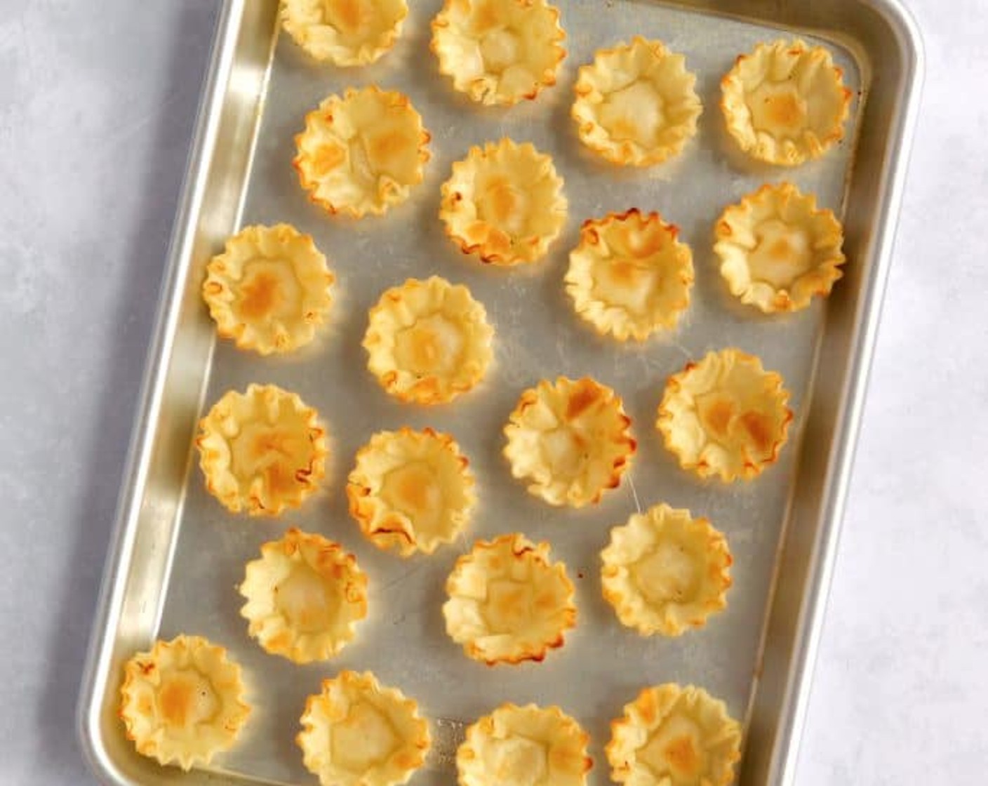 step 2 Line Phyllo Pastry Shells (3 boxes) on a baking sheet and bake in the preheated oven for 3-5 minutes until golden brown.