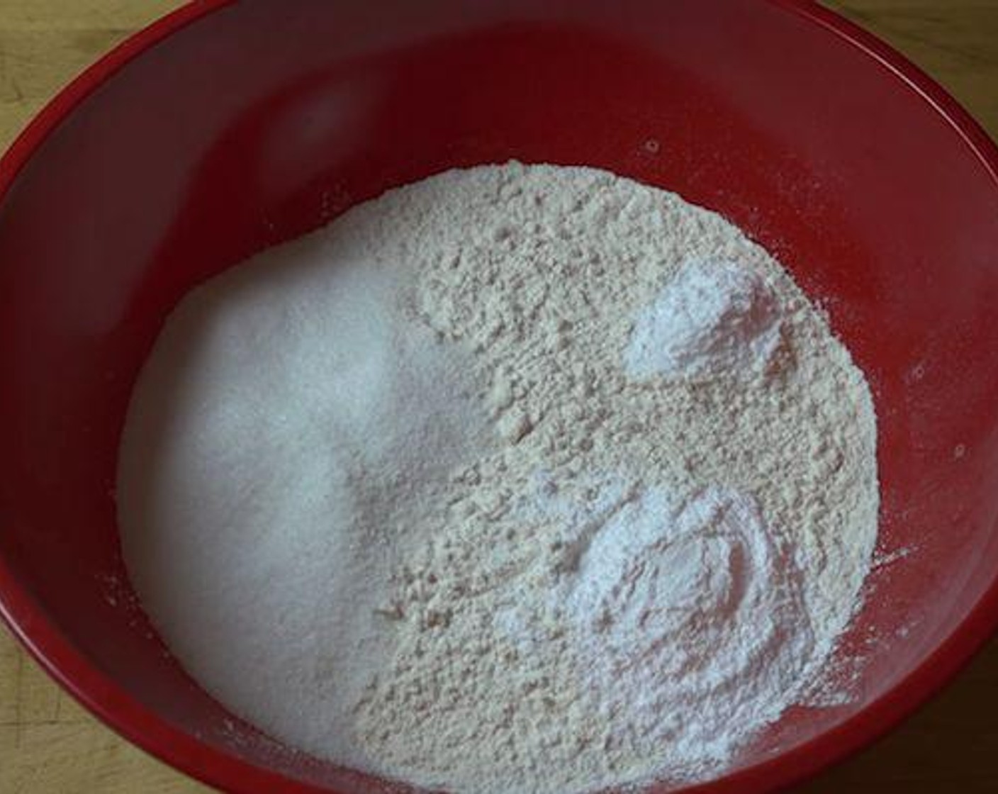 step 1 Into a big mixing bowl add All-Purpose Flour (4 cups), Granulated Sugar (1/2 cup), Baking Powder (1 Tbsp) and Baking Soda (1/2 Tbsp). Using a wooden spoon mixed until all combined.