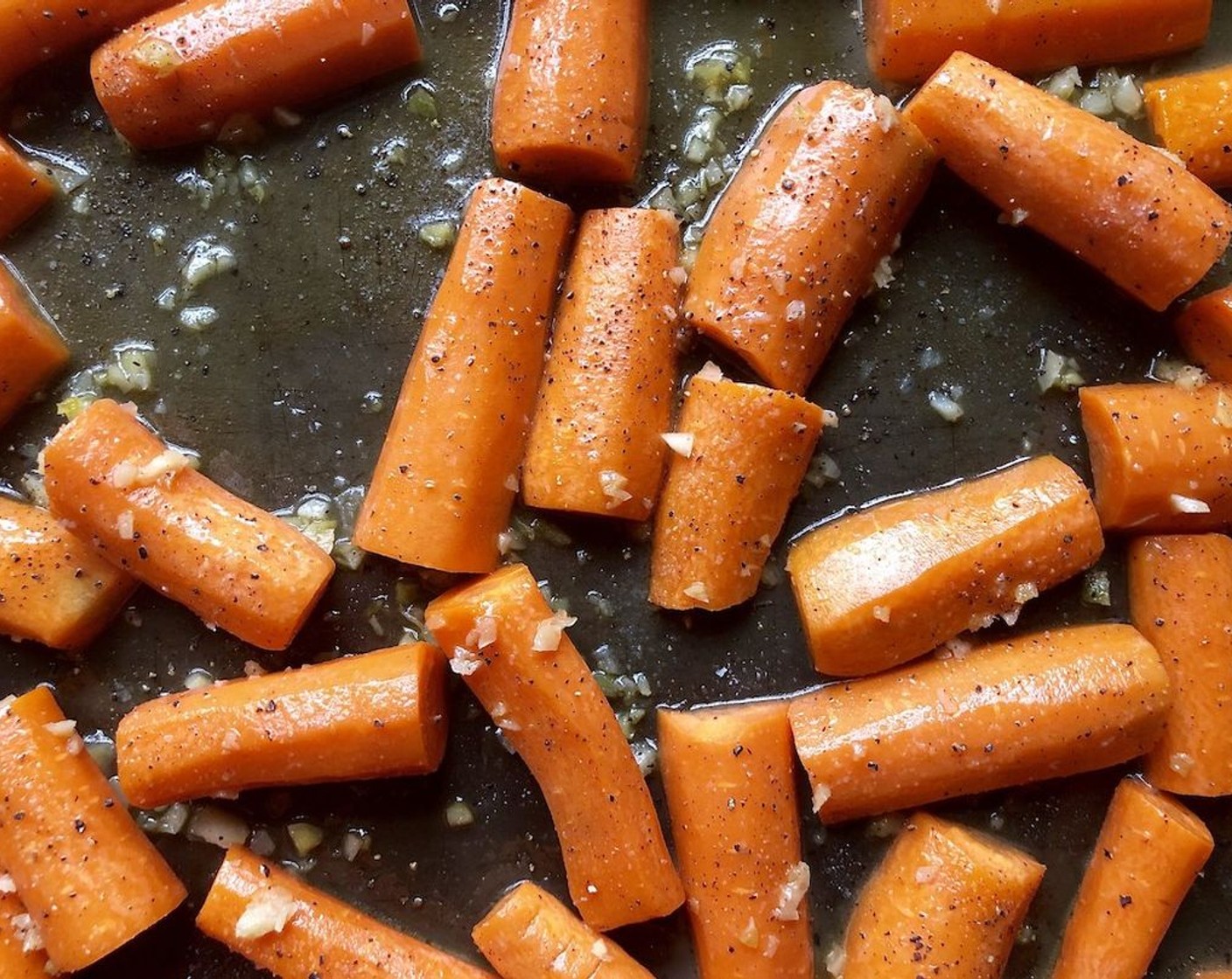 step 6 Transfer the carrots to the prepared baking sheet and arrange them in a single layer so that they roast evenly.