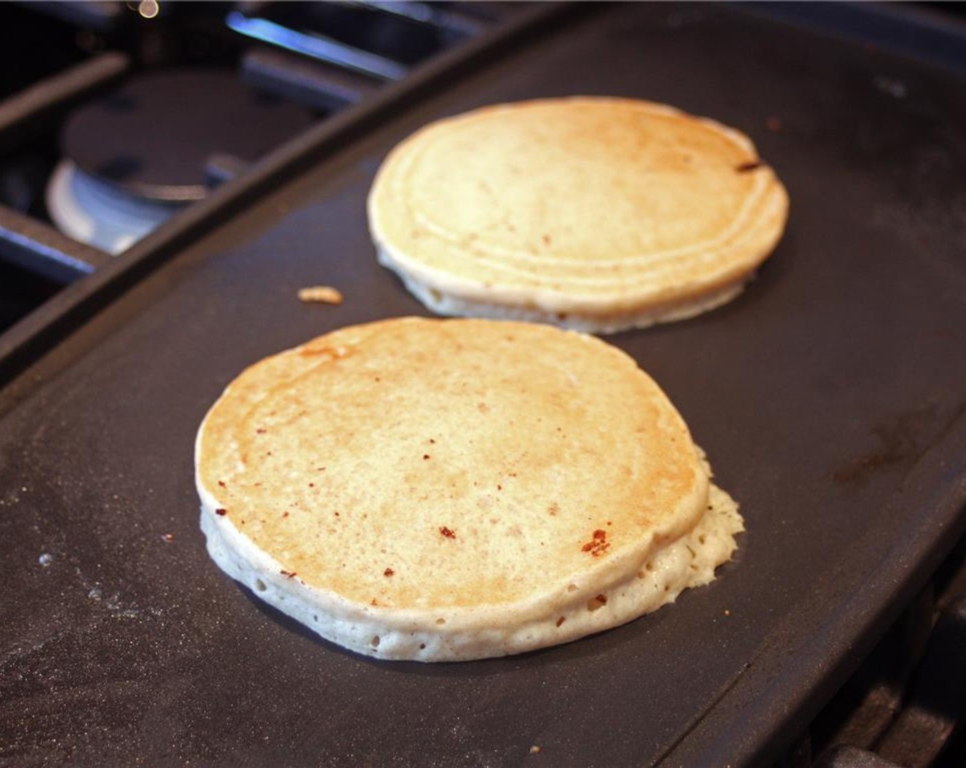 step 13 Once it is, flip the pancakes and cook for another 2-3 minutes.