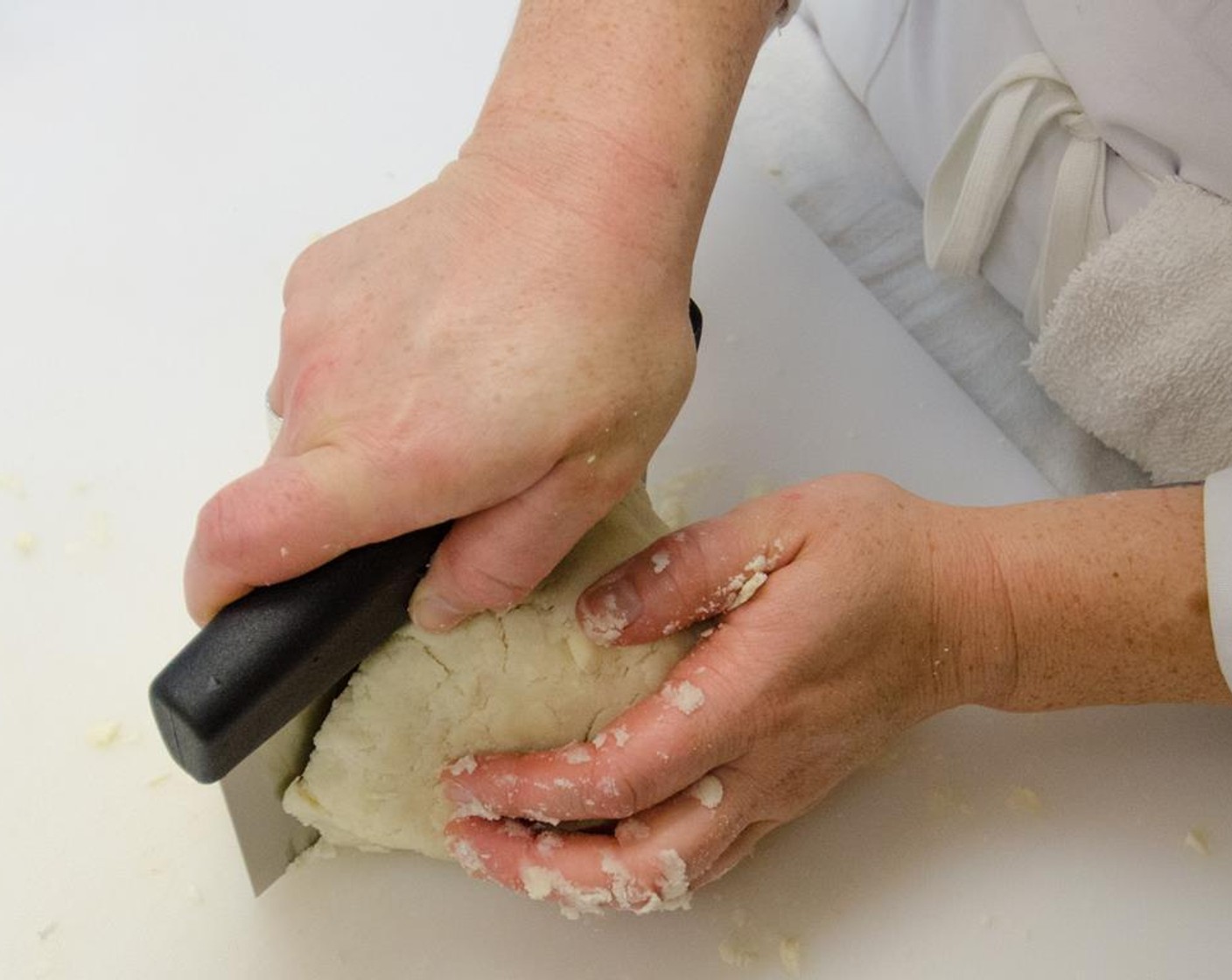 step 6 Once the dough has all come together. Divide it into two equal parts.