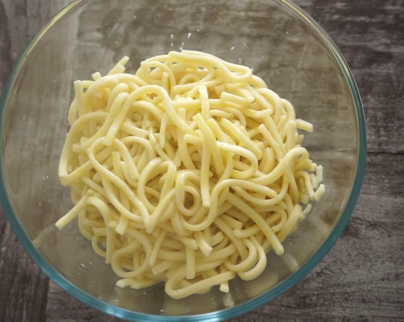 step 4 Drizzle some Extra-Virgin Olive Oil (as needed) over your pasta and mix through gently using a set of tongs.