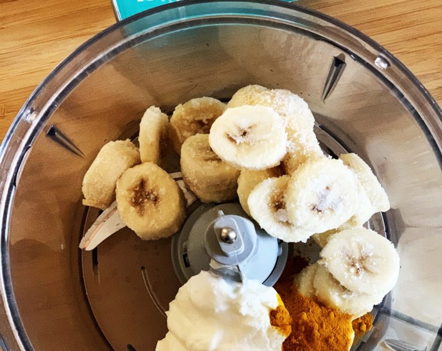 step 1 Place Bananas (3), Ground Turmeric (1 tsp), and Vegan Greek Yogurt (1/2 cup) in a food processor.