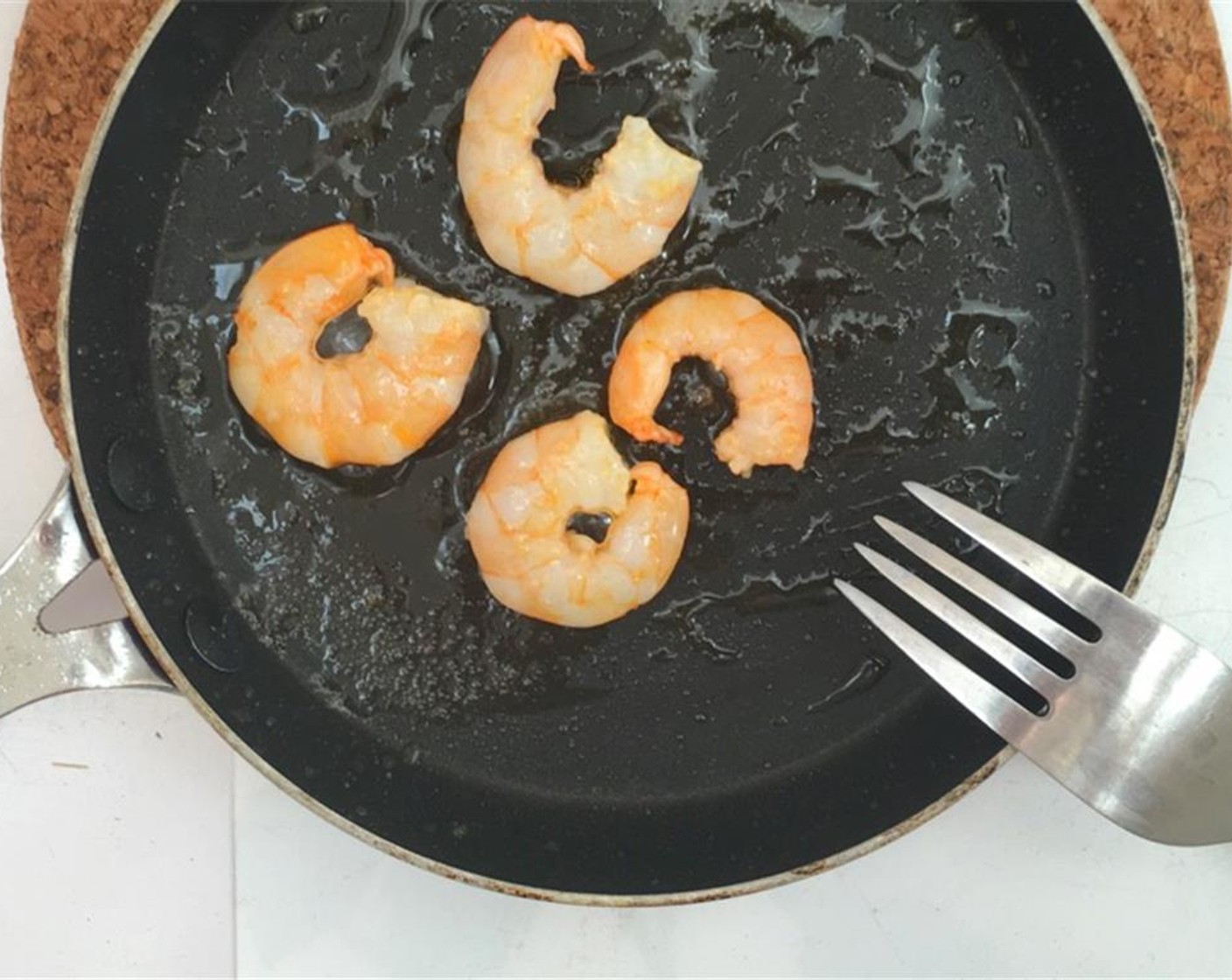 step 5 Melt half of the Unsalted Butter (1 tsp) a small non-stick pan over medium heat and then add the Shrimp (4).