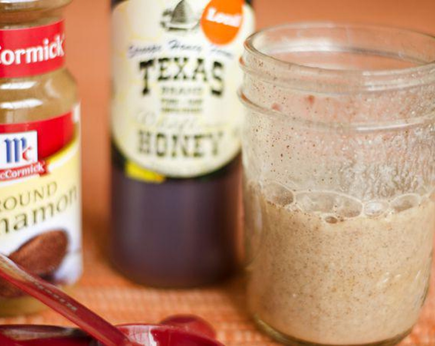 step 1 Whisk together the Honey (2 Tbsp), Fat-Free Yogurt (4 Tbsp), Simply Organic Cinnamon, Ground (1/2 tsp), Oranges (4 Tbsp) juice, Salt (1/8 tsp), and Ground Black Pepper (1/8 tsp).
