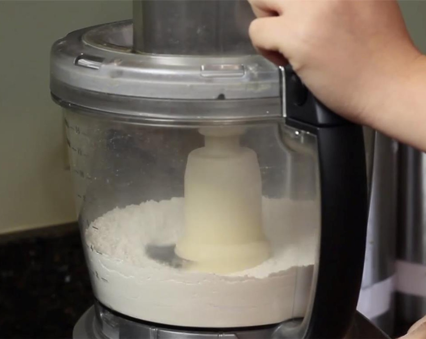 step 2 For the crust, put the All-Purpose Flour (2 cups), Kosher Salt (1/2 tsp), and Granulated Sugar (1 Tbsp) in the food processor with the blade attached. Pulse for a few seconds to combine.