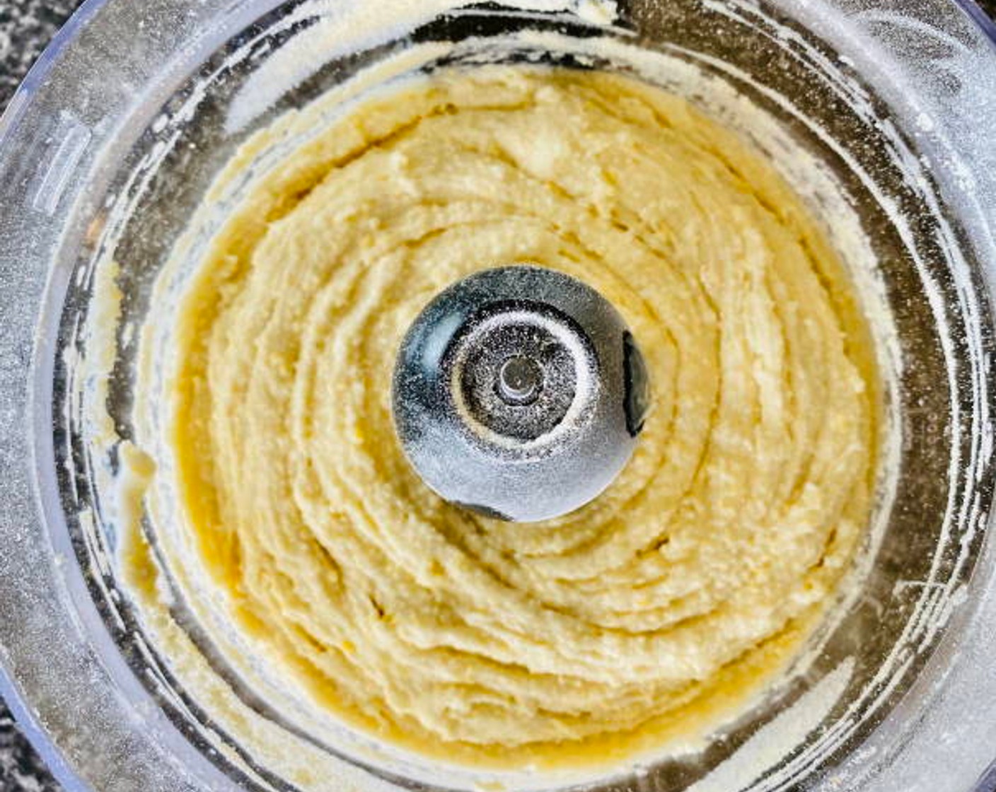 step 2 Add the Butter (1 Tbsp) and combine until you have little crumbs of dough similar to if you were making a crumble. Add the Egg (1) into the mix and pulse or mix by hand until the egg is incorporated.